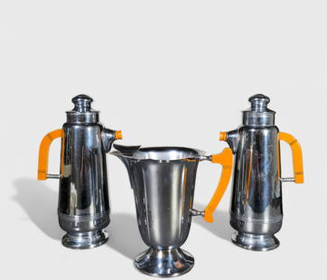 London & Brighton Cocktail Shaker & Pitcher: London & Brighton Cocktail Shaker & Pitcher. Cocktail shakers, pair. London, 1930's. Pitcher. Chrome plated metal and Bakelite. (3) Pieces total. 7w x 4 1/2d x 13h