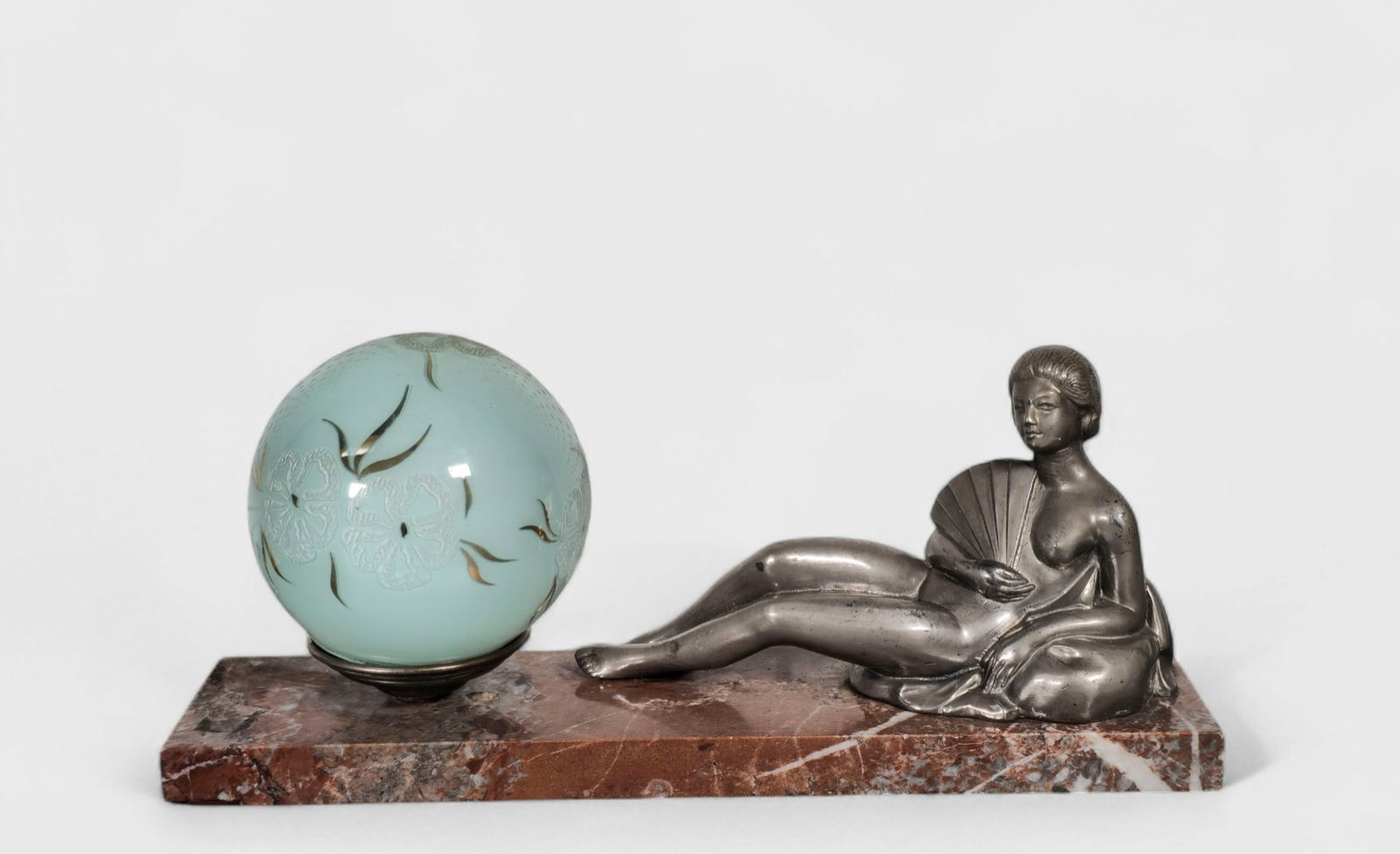Frech Art Deco Figural Lamp: Frech Art Deco Figural Lamp, France, 1920's. Silver leaf over brass, glass globe and marble. 12w x 3d x 12 3/5h