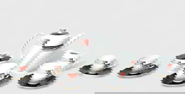 German Art Deco Porcelain Tea Set: German Art Deco Porcelain Tea Set. Teapot, creamer, sugar, (4) cups and (4) saucers. Marked to underside. Tea pot- 7 1/4w x 4d x 6h