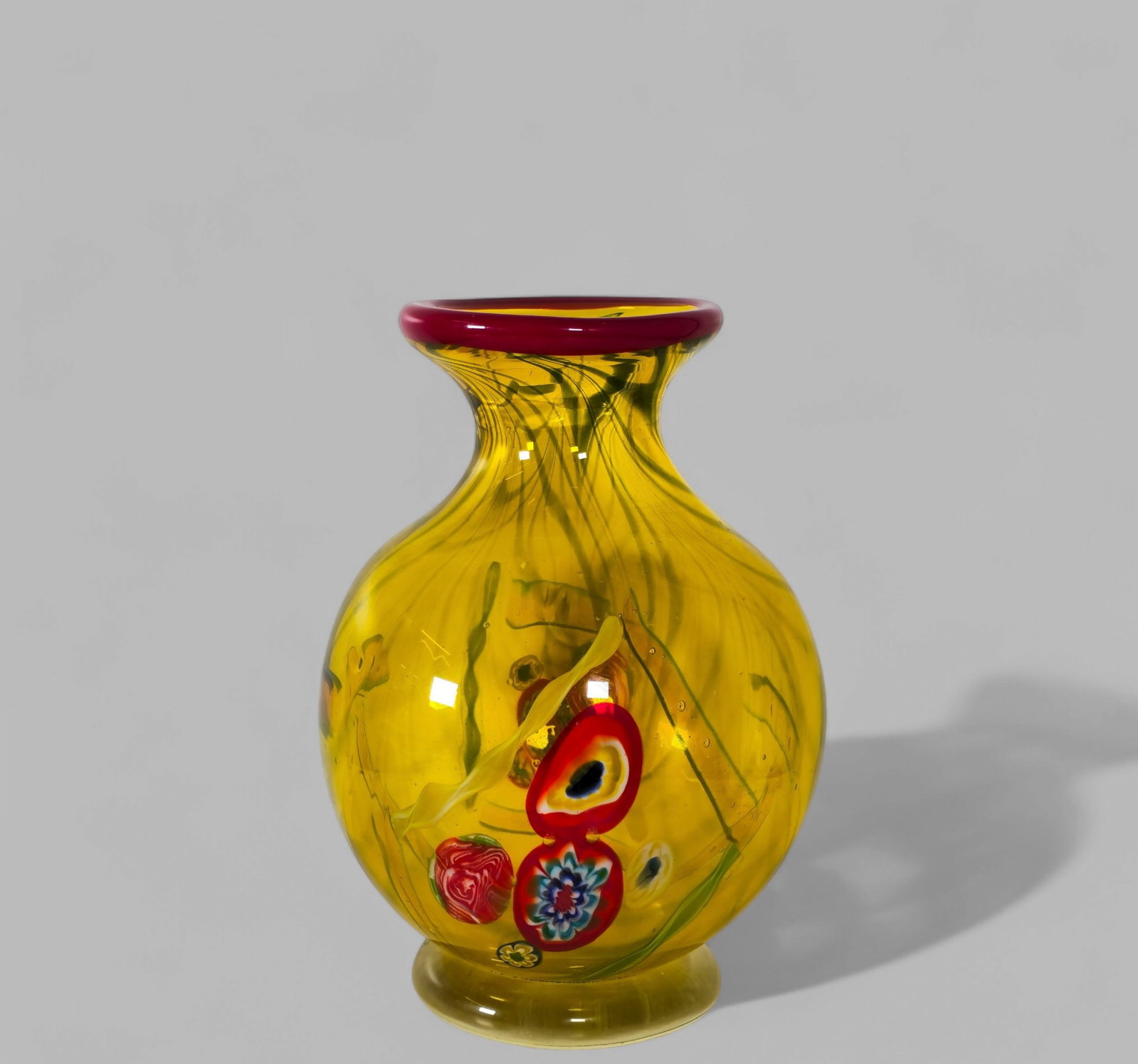 Murano Italian Vase: Murano Italian Vase, Italy 1980. Hand blown paper weight footed base.7 dia x 10 3/4h