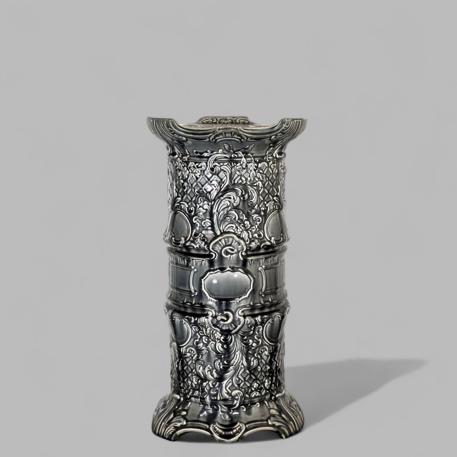 Majolica Pedestal: Majolica Pedestal, circa 1920's. Scalloped top and base. Scalloped shells, flowers and scrolled leaves over a quilted ground. 11 1/4w x 11 1/4d x 22 1/2h