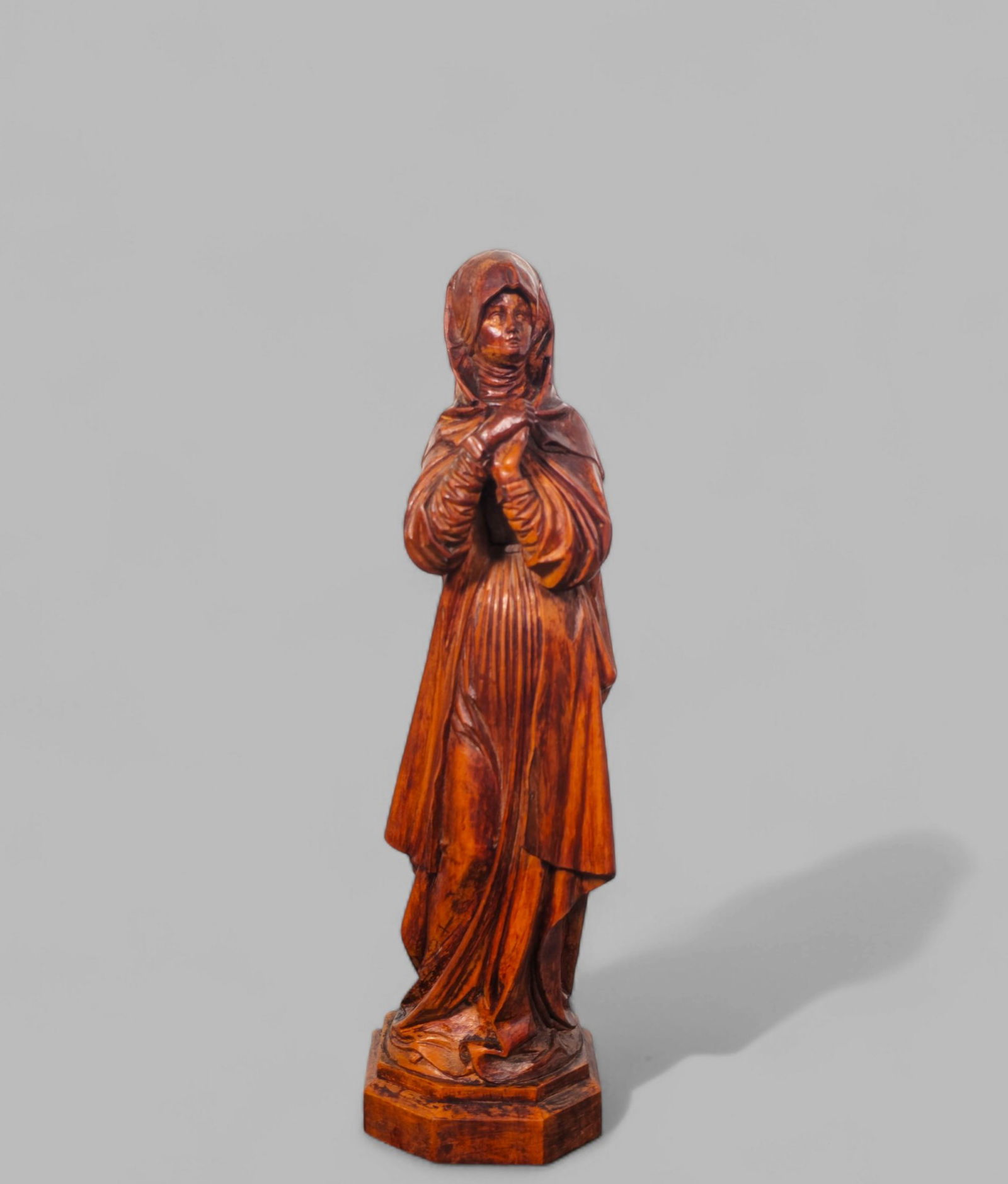 Carved Italian Walnut Sculpture of Lady In Hooded Dress: Carved Italian Walnut Sculpture of Lady In Hooded Dress, circa 1940. Signed on underside. 3w x 3 3/4d x 11 1/3h.