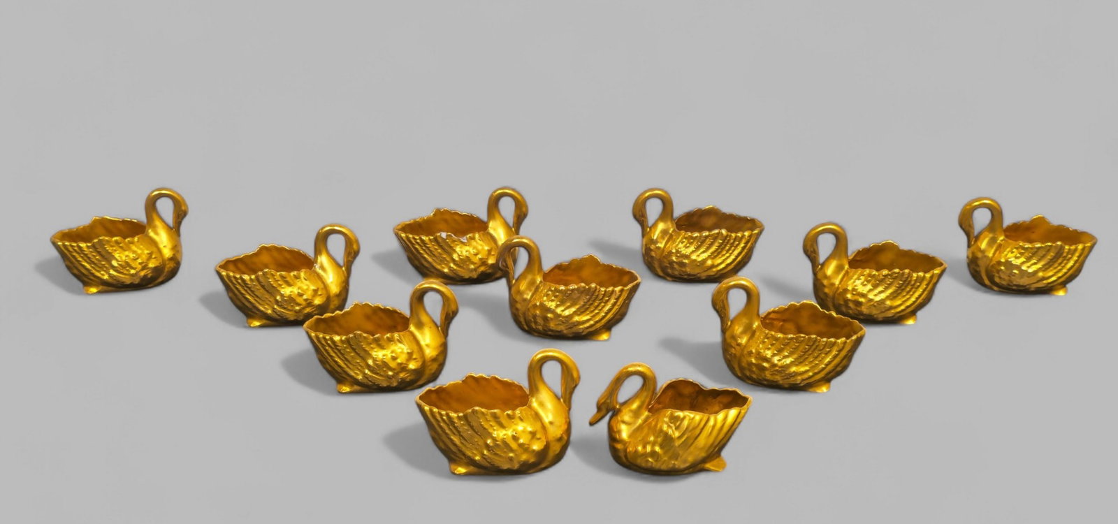 19th Century William Lycett Gilt Porcelain Salts: 19th Century William Lycett Gilt Porcelain Salts, set of (11), circa 1883, USA. Original label to underside. 2 3/4w x 1 1/2d x 2h.