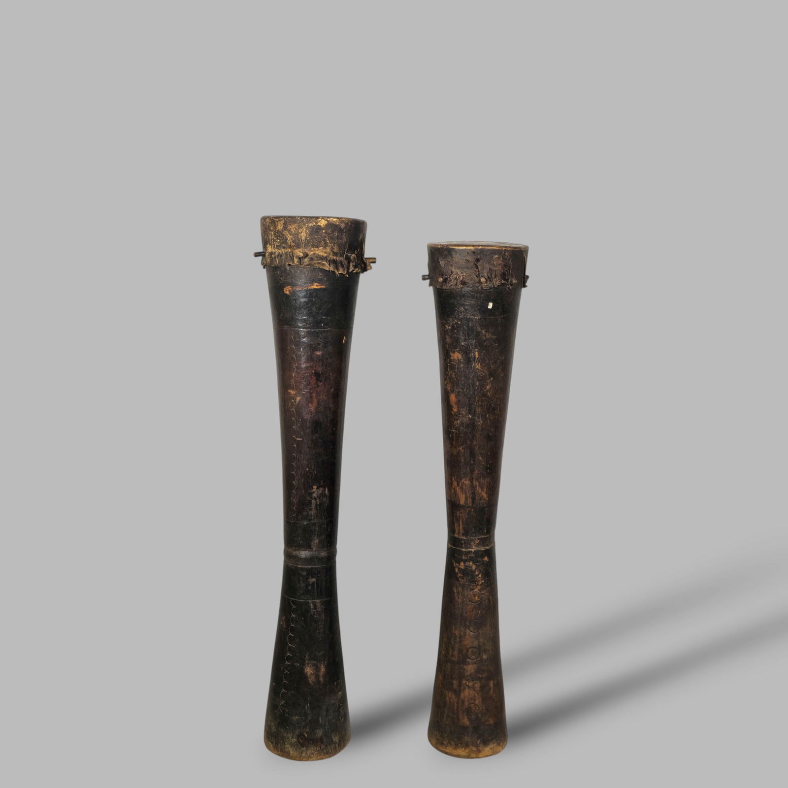 African Wooden Drums: Late 19th to early 20th century African wooden drums. Likely Ngoma Wooden Drum from Zimbabwe. 9 1/2dia x 48h