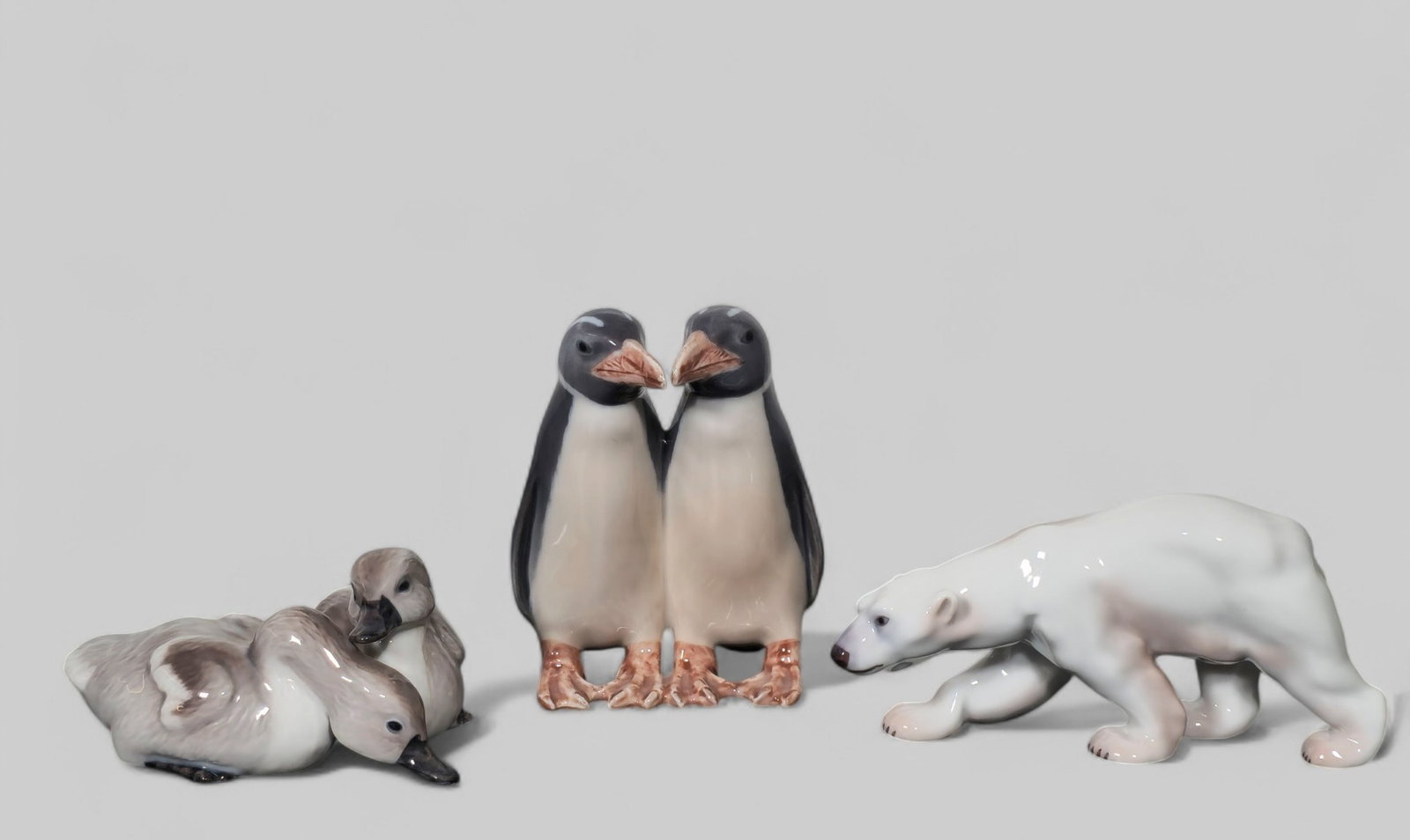 Assembled Royal Copenhagen #891 Penguin, #439 Polar Bear and #363 Ducks: Assembled Royal Copenhagen #891 Penguin, #439 Polar Bear and #363 Ducks. Artist's and Manufacturer's mark to underside. Penguins - 3 w x 2 3/4 d x 4 h.