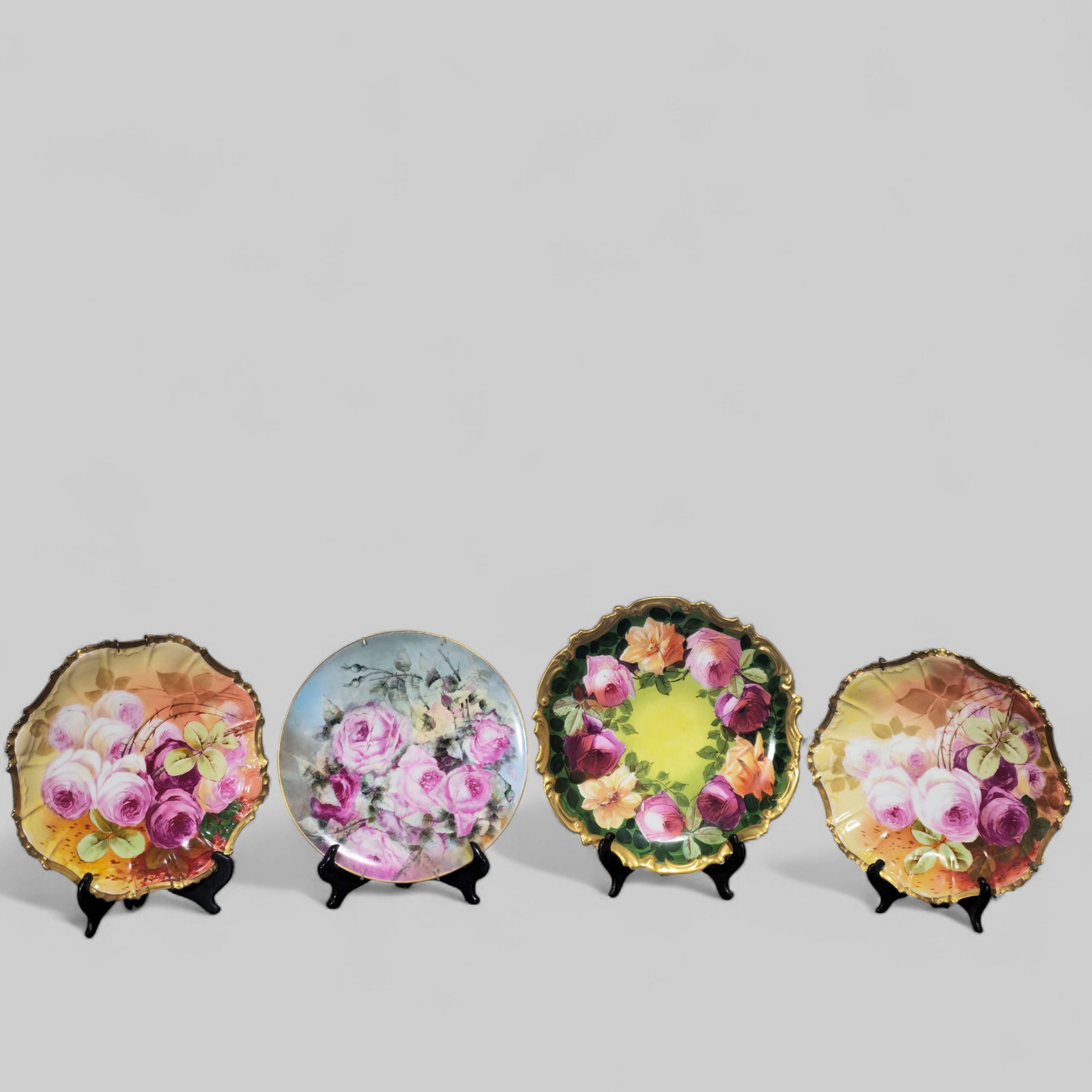Assembled Limoges Hand Painted Gilt Plates: Assembled Limoges Hand Painted Gilt Plates. 4 total. Each have floral decorating with gilt borders. Largest 13 1/4 dia x 2 1/8h.