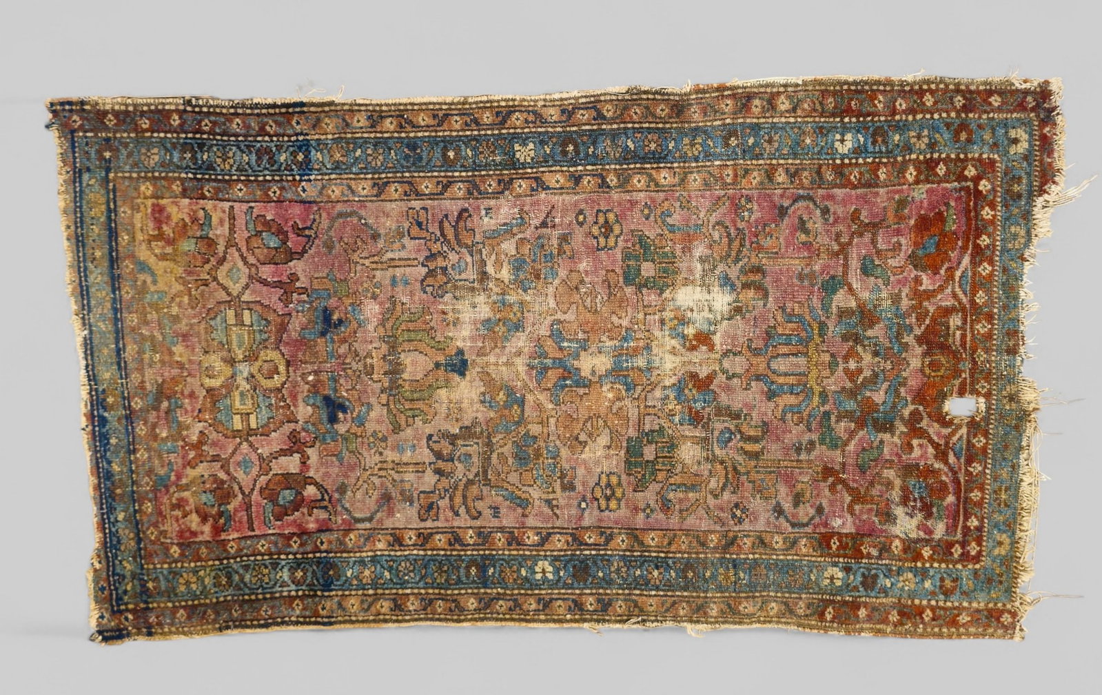 Mashad Area Rug: Mashad Area Rug. All over garden design over a pink field. Multiple layer borders. 2 ft 7 3/4 in x 4 ft 9 in.
