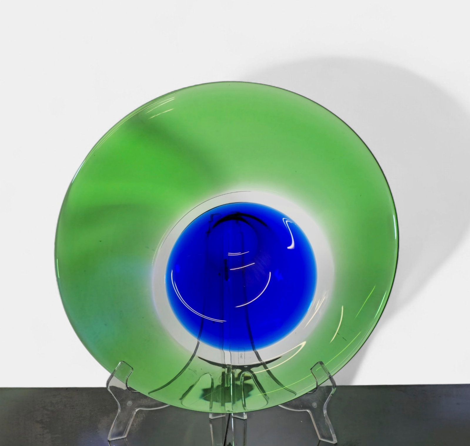 Murano Sommerso Art Glass Charger: Murano art glass charger featuring a layered Sommerso design with deep cobalt blue center encased in vibrant green glass. Smooth circular form with polished base and clear rim transition. 15 1/2w x 16