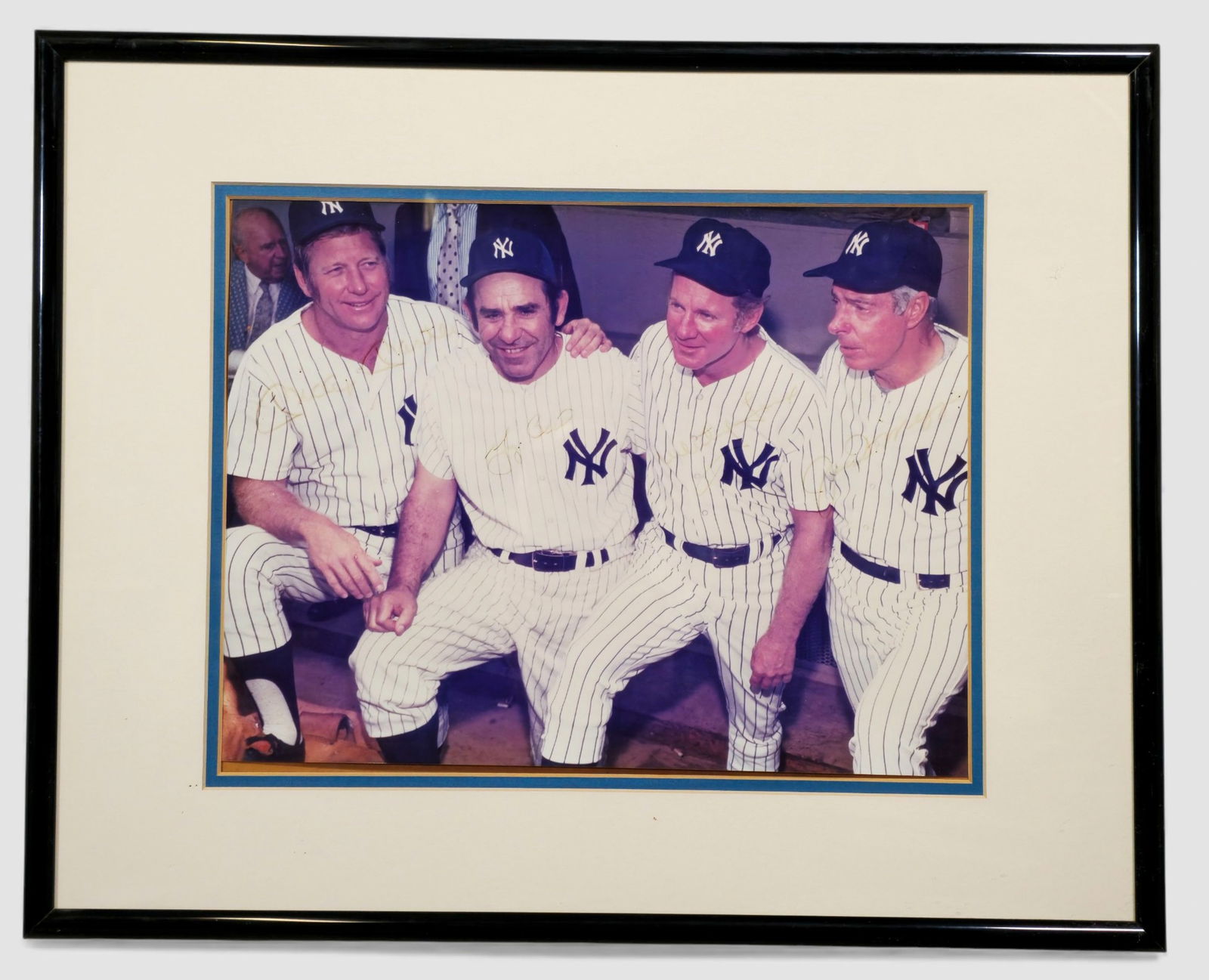 Joe DiMaggio, Mickey Mantle, Yogi Berra & Whitey Ford – Autographed Photograph: Joe DiMaggio (1914–1999), Mickey Mantle (1931–1995), Yogi Berra (1925–2015), and Whitey Ford (1928–2020), hand-signed color photograph featuring four of the greatest New York Yankees legends.