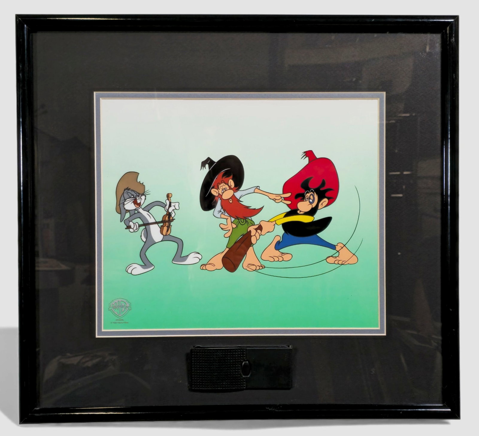Warner Bros. Animation Art, Sericel “Hillbilly Hare" with ToonTrax module, 1998: Warner Bros. Animation Art, Hillbilly Hare, 1998 Sericel with integrated ToonTrax audio module, featuring Bugs Bunny playing fiddle while two feuding hillbillies square-dance in classic slapstick fash