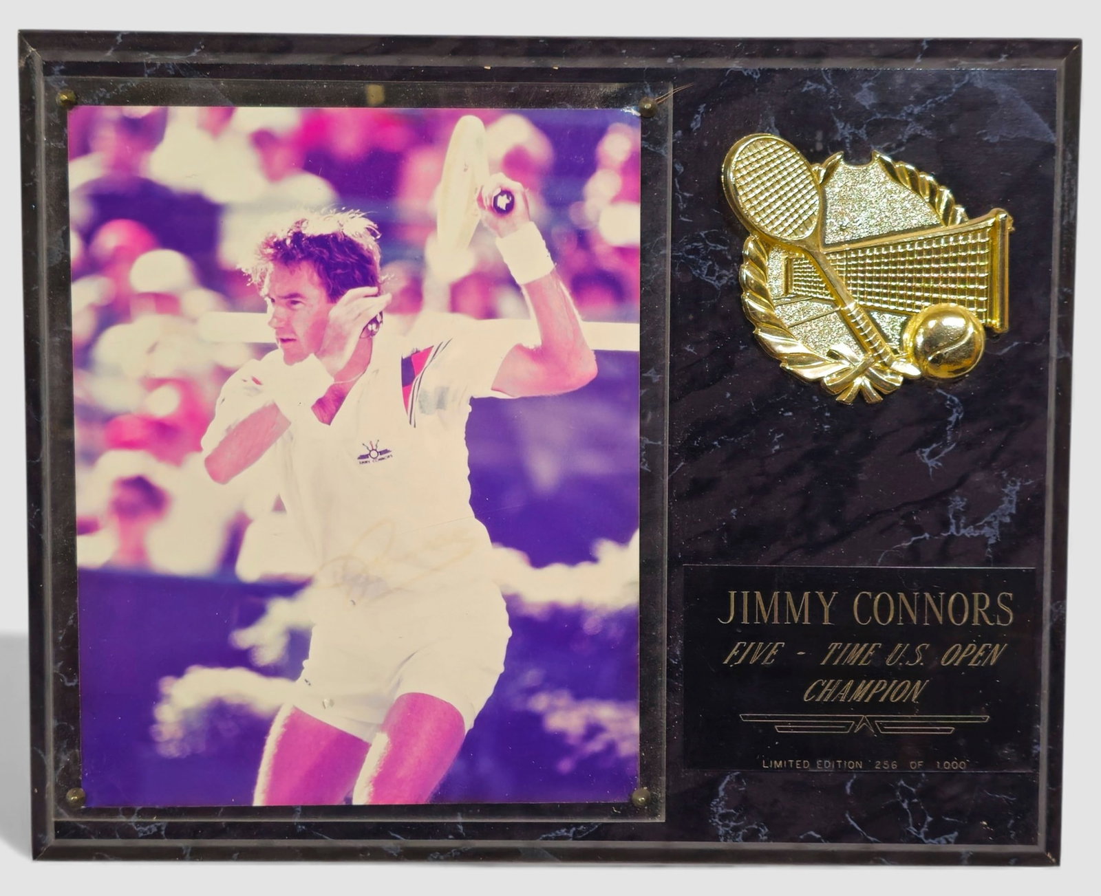 Jimmy Connors Autographed Limited-edition Plaque: Limited-edition plaque featuring an action photograph of tennis legend Jimmy Connors, personally autographed and accompanied by a Score Board, Inc. Certificate of Authenticity. Includes gold-tone tenn