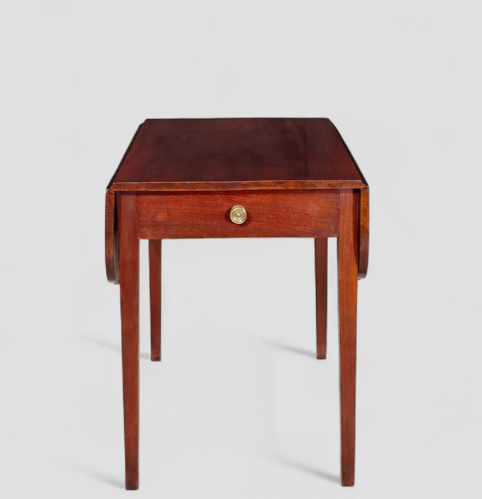 19th Century New York Mahogany Signed Pembrook Table: 19th Century New York Mahogany Signed Pembrook Table. Circa 1800-1810. Elliptical corners, single boards and brass pulls. Poplar secondary wood with dovetailed construction. Original glue blocks and