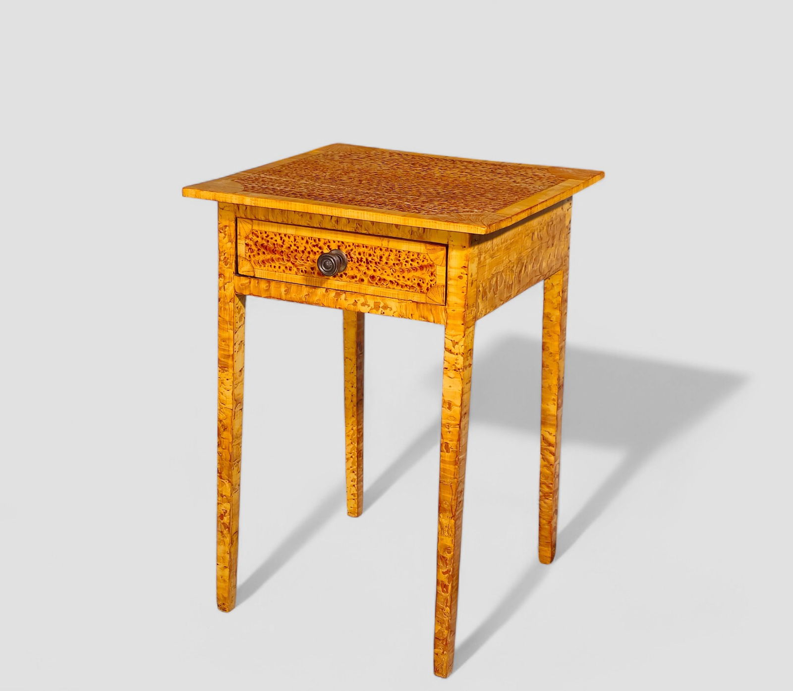 19th Century Grain Painted One Drawer Side Table: 19th Century Grain Painted One Drawer Side Table. Table Circa 1870. Paint circa 1970. Grain painted tiger and birds eye maple later 20th century. Square legs and brass turned pull. 18 1/2w x 17 1/2d x