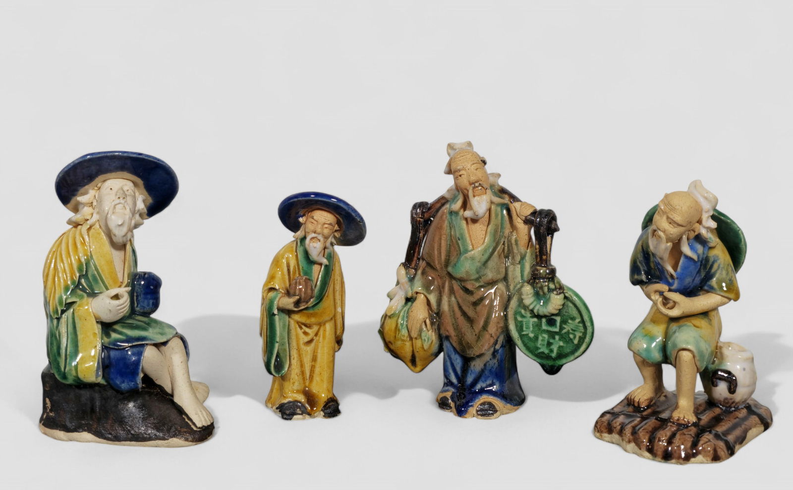 Early 20th Century Chinese Mud Men for Bonsai Pots: Early 20th Century Chinese Mud Men for Bonsai Pots. Circa 1920s. Chinese mark to underside. Tallest - 4 1/4h. Smallest - 3 5/8h.