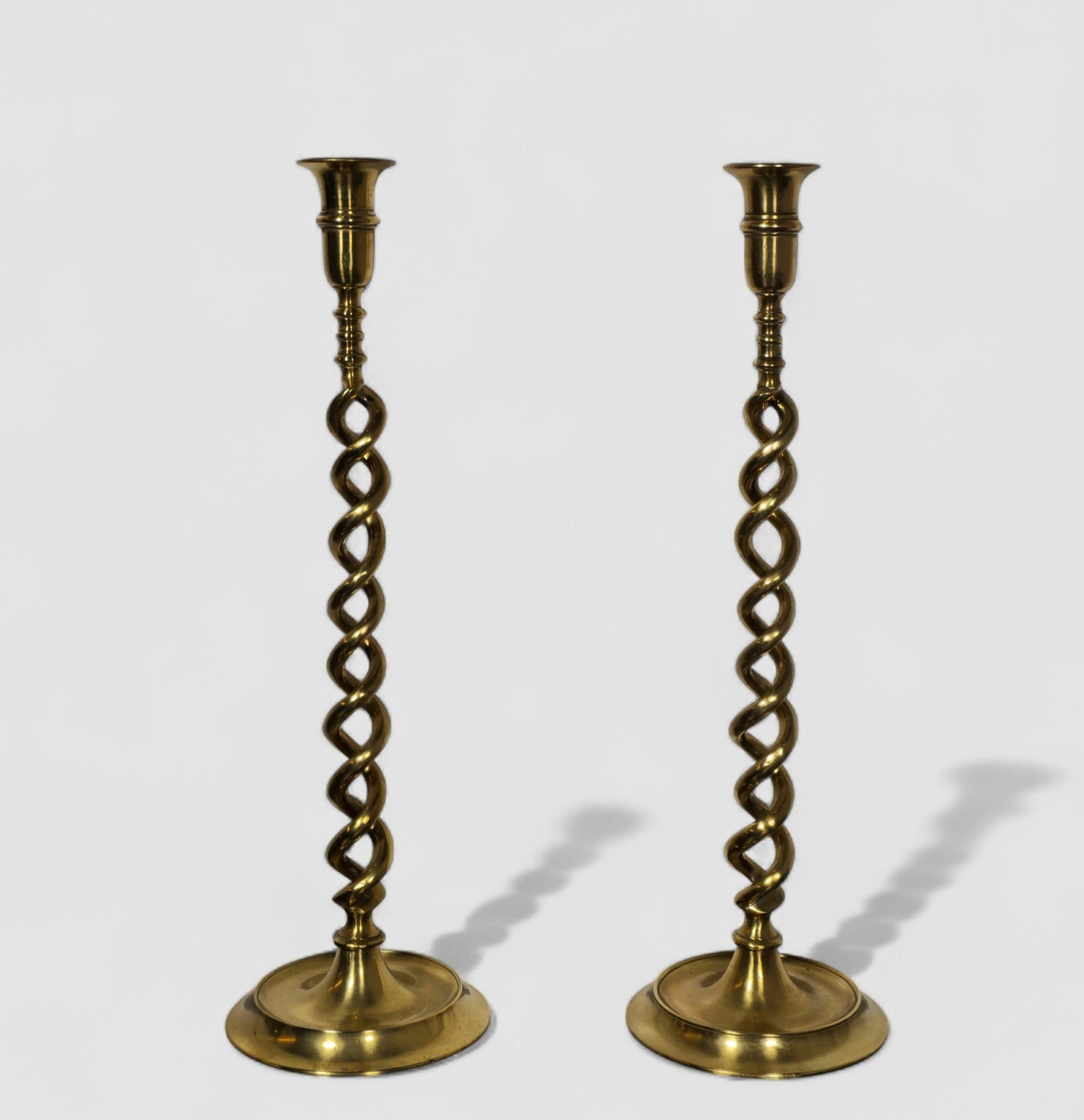 Unusually Tall 19th Century Brass Open Twist Candlesticks: Unusually Tall 19th Century Brass Open Twist Candlesticks. Pair. Circa 1860-1870. England. 5 1/2dia x 18h.