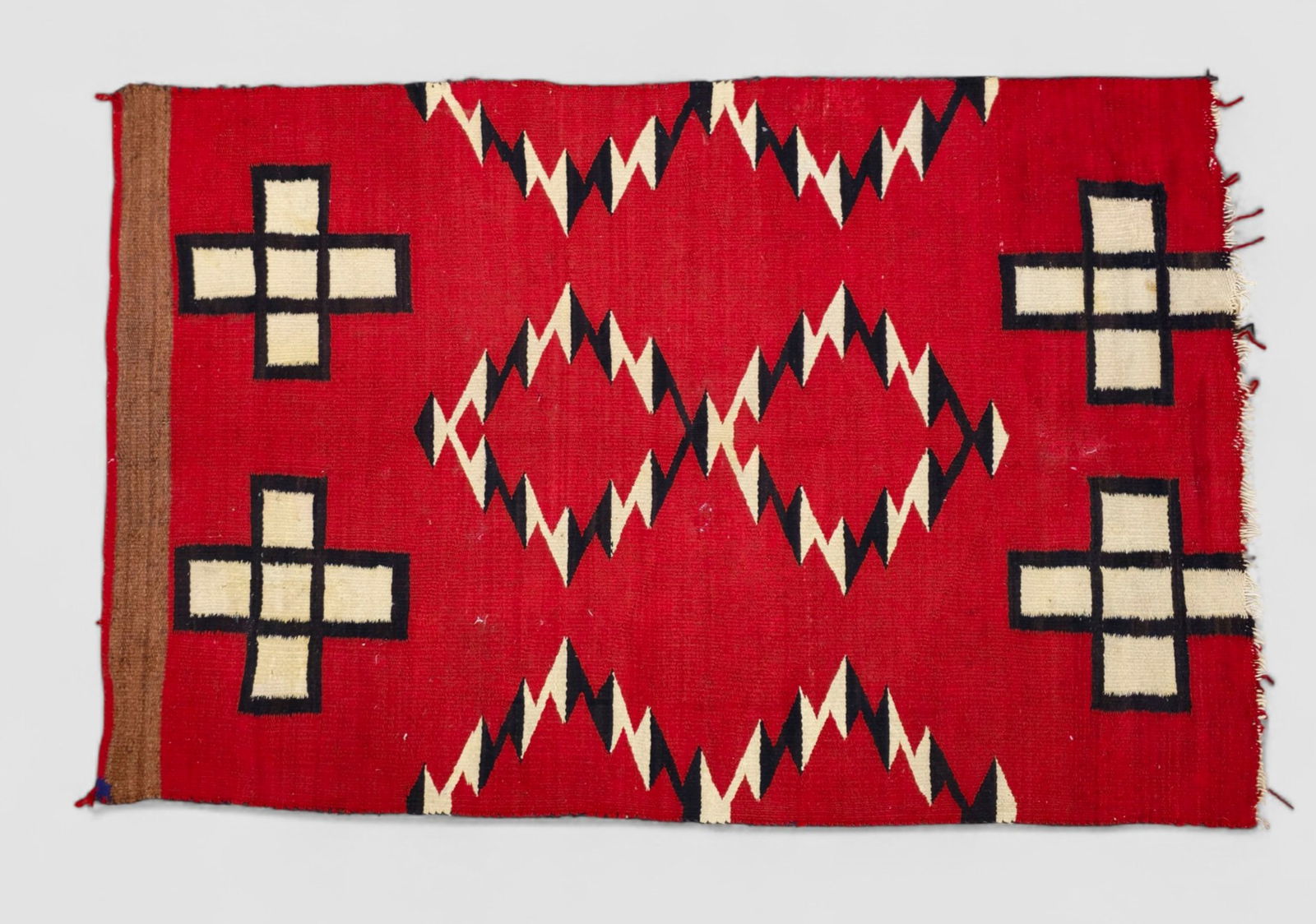 Navajo Area Rug: Navajo Area Rug, Circa 1920s. Four cross design. 2 ft 11 in x 4 ft 5 in.