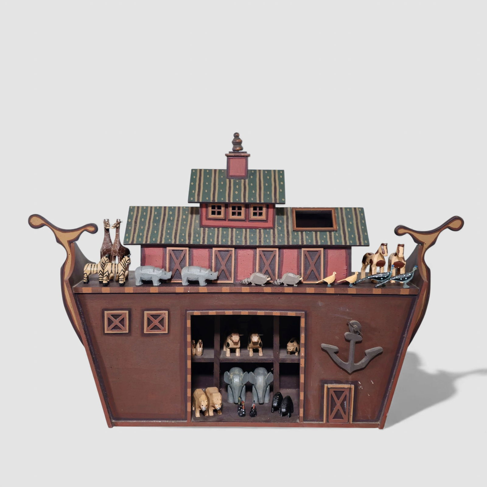 American Studio Craft Carved Noah's Ark and Animals: American Studio Craft Carved Noah's Ark and Animals. American. 1960s. Hand crafted and painted ark. 14 different pair of animals. Ark - 31 1/2w x 8d x 20 3/4h.