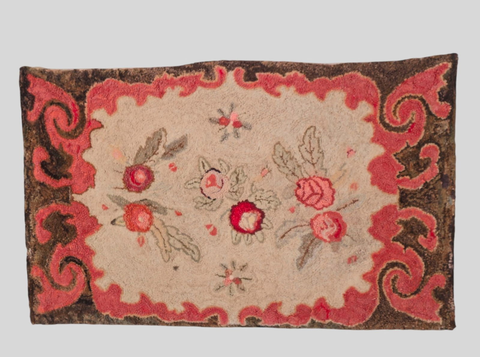 19th Century Folk Art Floral Rug: 19th Century Folk Art Floral Rug. Circa 1890. Shirred floral center on an ivory field. Swirl design border. Professional mounted. 3ft 7 3/8in x 2ft 2 3/4in.