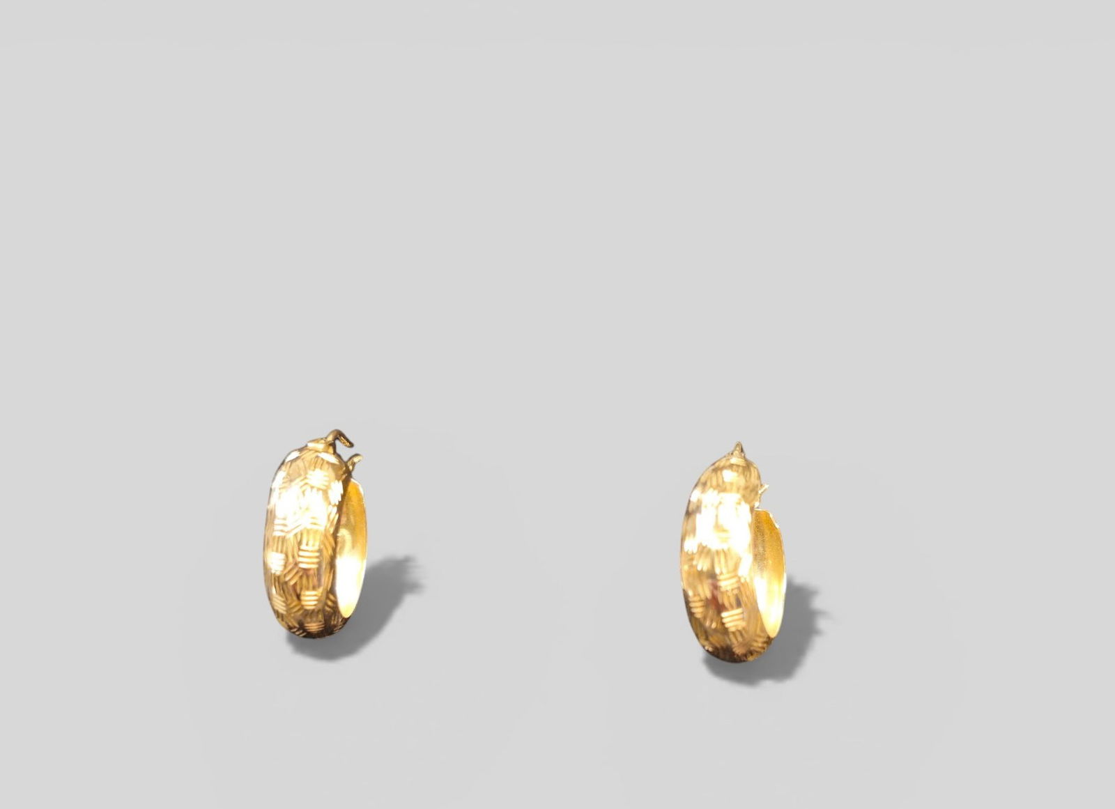 14K Gold Hoop Etched Earrings: 14K Gold Hoop Etched Earrings. Weight - 45 grams. 5/8" diameter