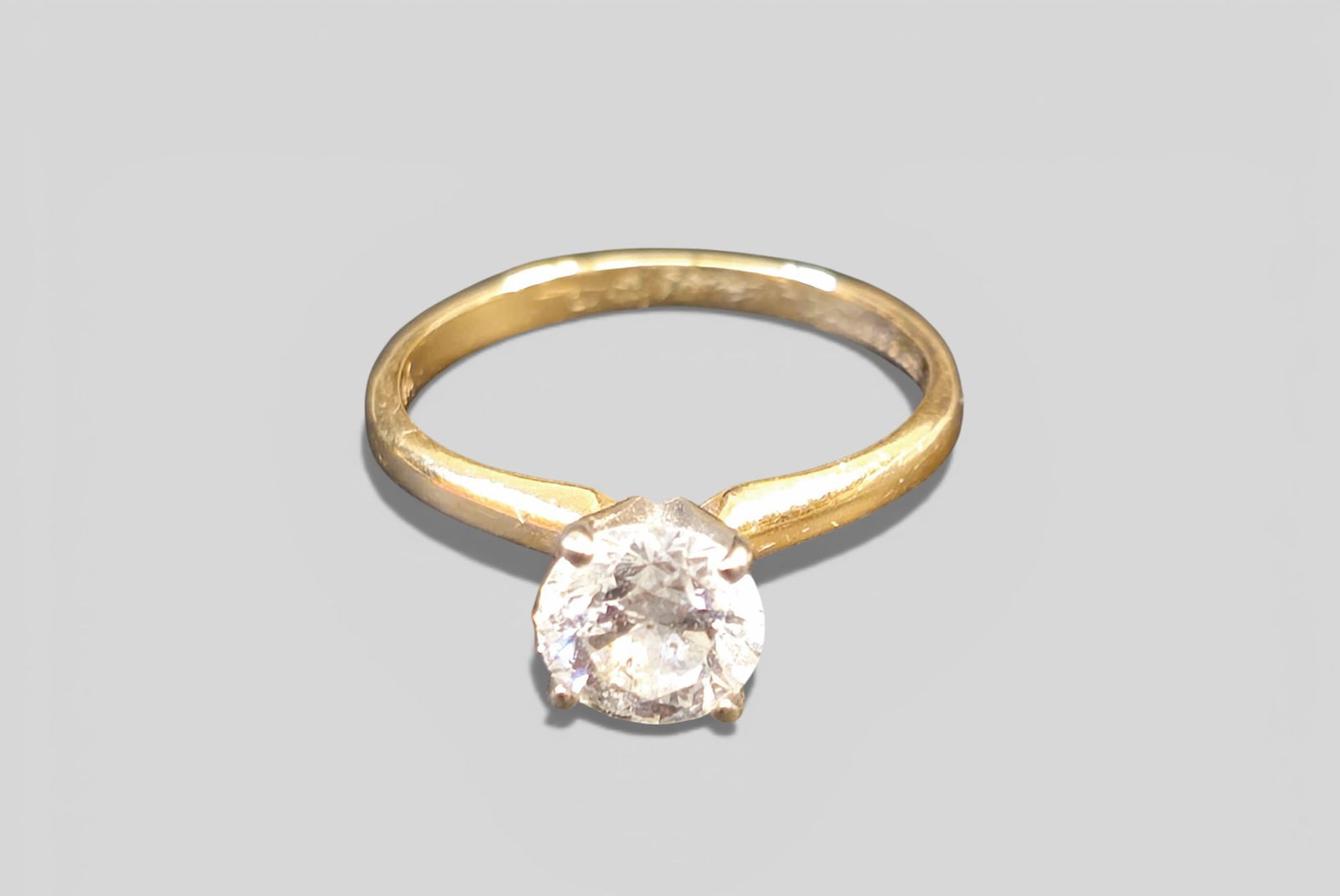 14K Diamond Solitaire Ring 3/4 Carat: 14K Diamond Solitaire Ring 3/4 Carat. Set in yellow gold band. Total gross weight - 2.4g. Size 5 3/4.