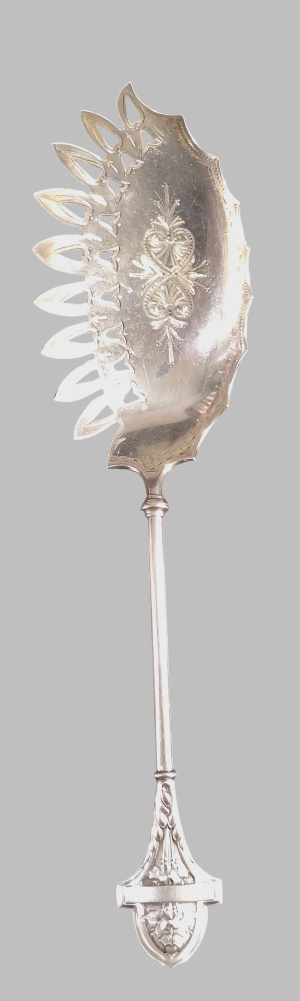 19th Century Gorham "Lotus" Sterling Silver Macaroni Server: 19th Century Gorham "Lotus" Sterling Silver Macaroni Server. 1865. Bright-cut design on the serving blade. Beautifully shaped handle with hand-chased flowers and leaves. Manufacturer's mark to