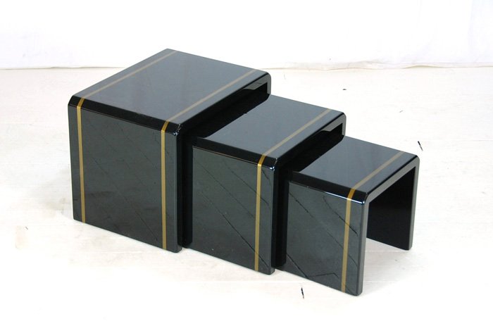 Karl Springer, Attribution: Set of three nesting tables. Graduated size, black lacquer, gold band lacquer declaration. The Jay Dunkelman Collection. Used in his private residence. Larger 22L x 15.75D x 16.75H, 14.75H, 13H