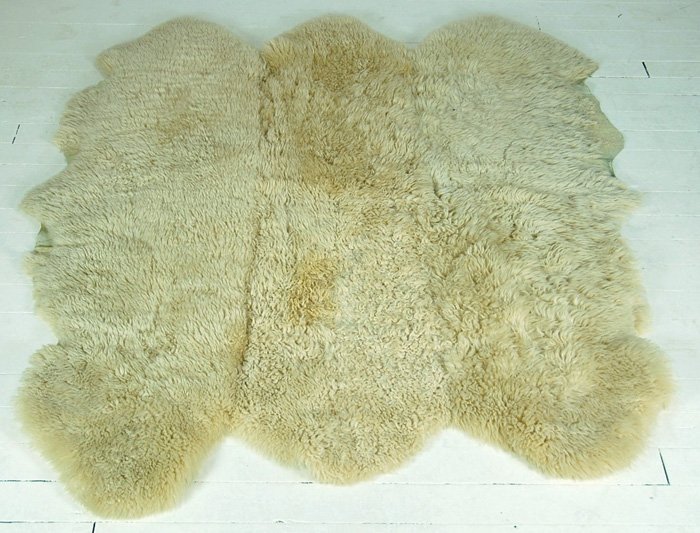 Sheep Skin Rug: Nice Scandinavian vintage sheepskin rug in nice original condition. Size 61 x 68