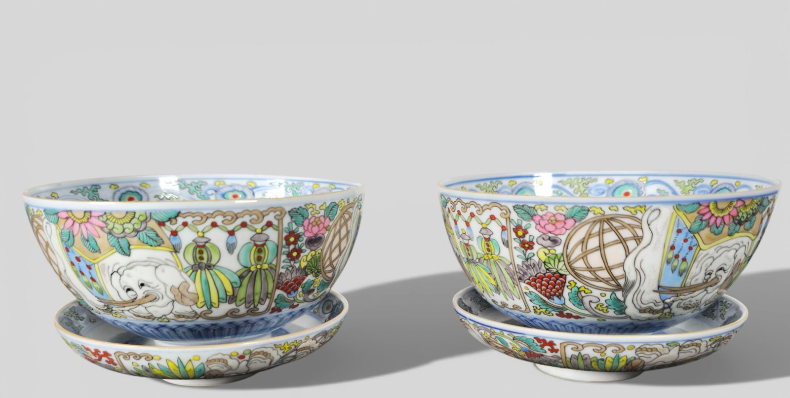 18th Century Pair of Chinese Famille Rose Porcelain Covered Tea Bowls: 18th Century Pair of Chinese Famille Rose Porcelain Covered Tea Bowls. A fine pair of 18th century Chinese Famille Rose porcelain covered tea bowls, each delicately enameled with soft pastel floral mo