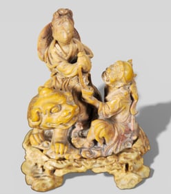 Chinese Finely Carved Hardstone Group with Guanyin on a Buddhist Lion, 19th Century