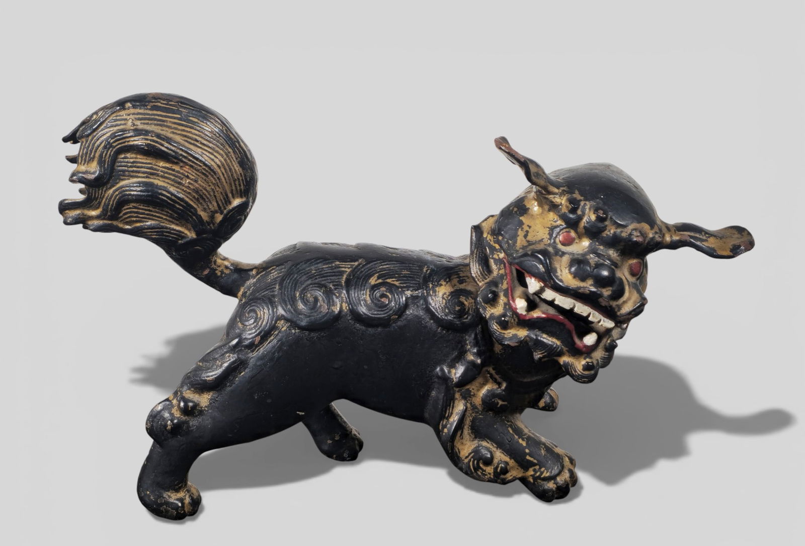 Chinese Cast Guardian Mythical Creature, Ming Dynasty: Chinese Cast Guardian Mythical Creature, Ming Dynasty. Cast metal guardian mythical creature dating to the Ming Dynasty, likely created as an architectural element or protective symbol. The figure