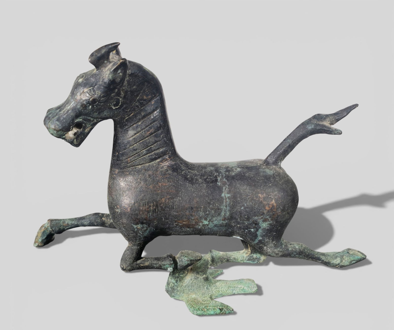 Chinese Bronze “Flying Horse of Gansu,” Eastern Han Dynasty: Chinese Bronze “Flying Horse of Gansu,” Eastern Han Dynasty. Finely cast bronze sculpture of the iconic “Flying Horse of Gansu,” dating to the Eastern Han Dynasty. The horse