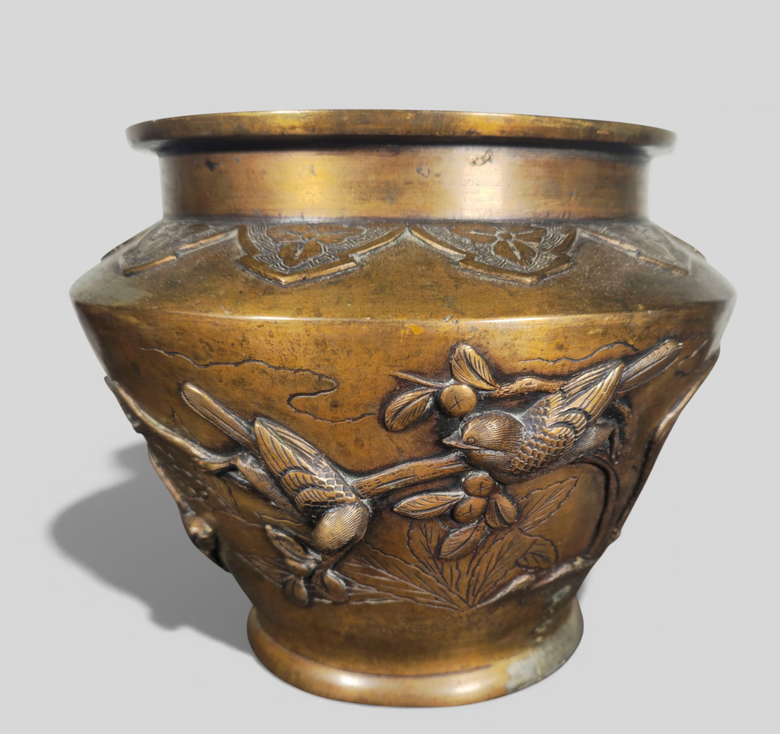 Japanese Meiji Period Jardinière with High‑Relief Bird Decoration: Japanese Meiji Period Jardinière with High‑Relief Bird Decoration. A finely crafted Japanese Meiji period jardinière featuring high‑relief decoration of birds in flight and