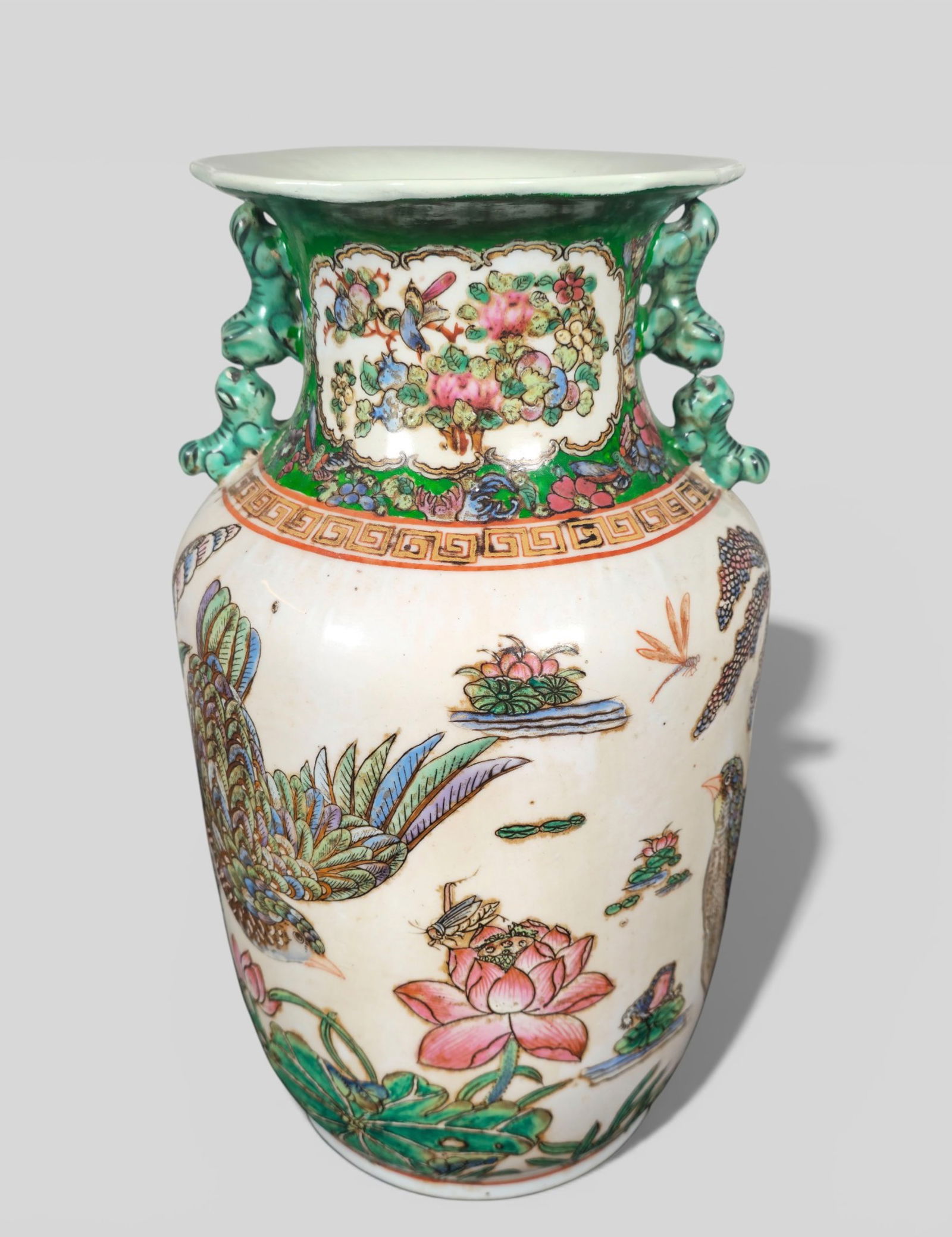 18th Century Chinese Famille Rose Porcelain Vase, Rose Canton Style: 18th Century Chinese Famille Rose Porcelain Vase, Rose Canton Style. An 18th century Chinese famille rose porcelain vase decorated in the vibrant style often referred to as Rose Canton, featuring a