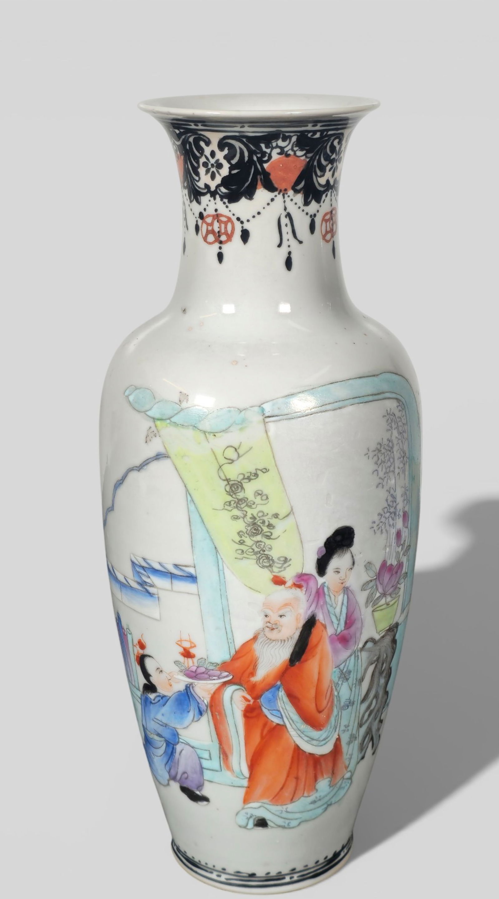 Late 19th or Early 20th Century Hand‑Painted Export Famille Porcelain Vase: Late 19th or Early 20th Century Hand‑Painted Export Famille Porcelain Vase. A late 19th or early 20th century hand‑painted export famille porcelain vase decorated with Chinese figures in
