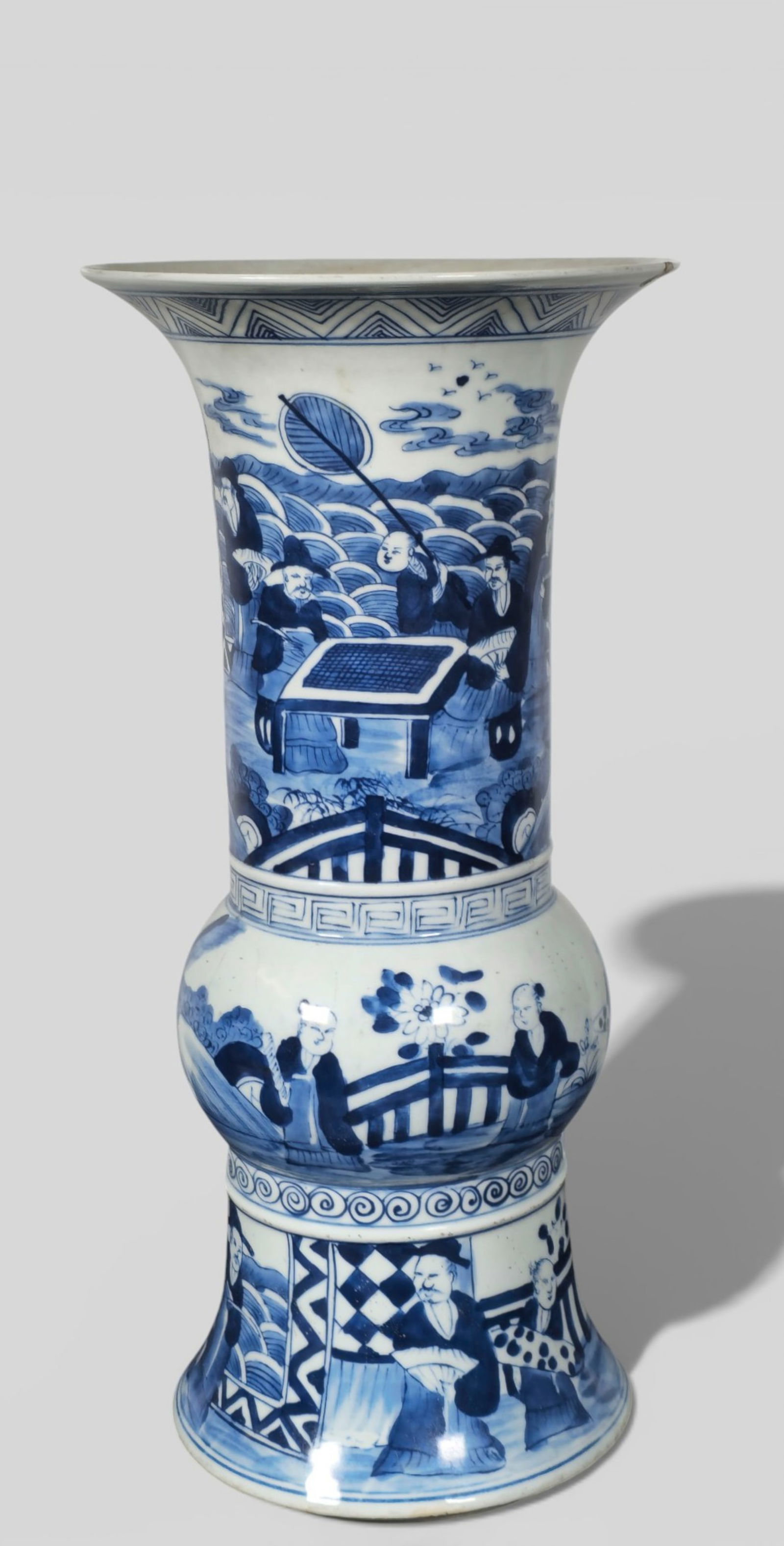Chinese Blue & White Gu‑Form Vase, Kangxi Mark: Chinese Blue & White Gu‑Form Vase, Kangxi Mark. Tall beaker vase painted with figures playing Go in a continuous landscape. Strong cobalt and classic Kangxi borders; six‑character marks