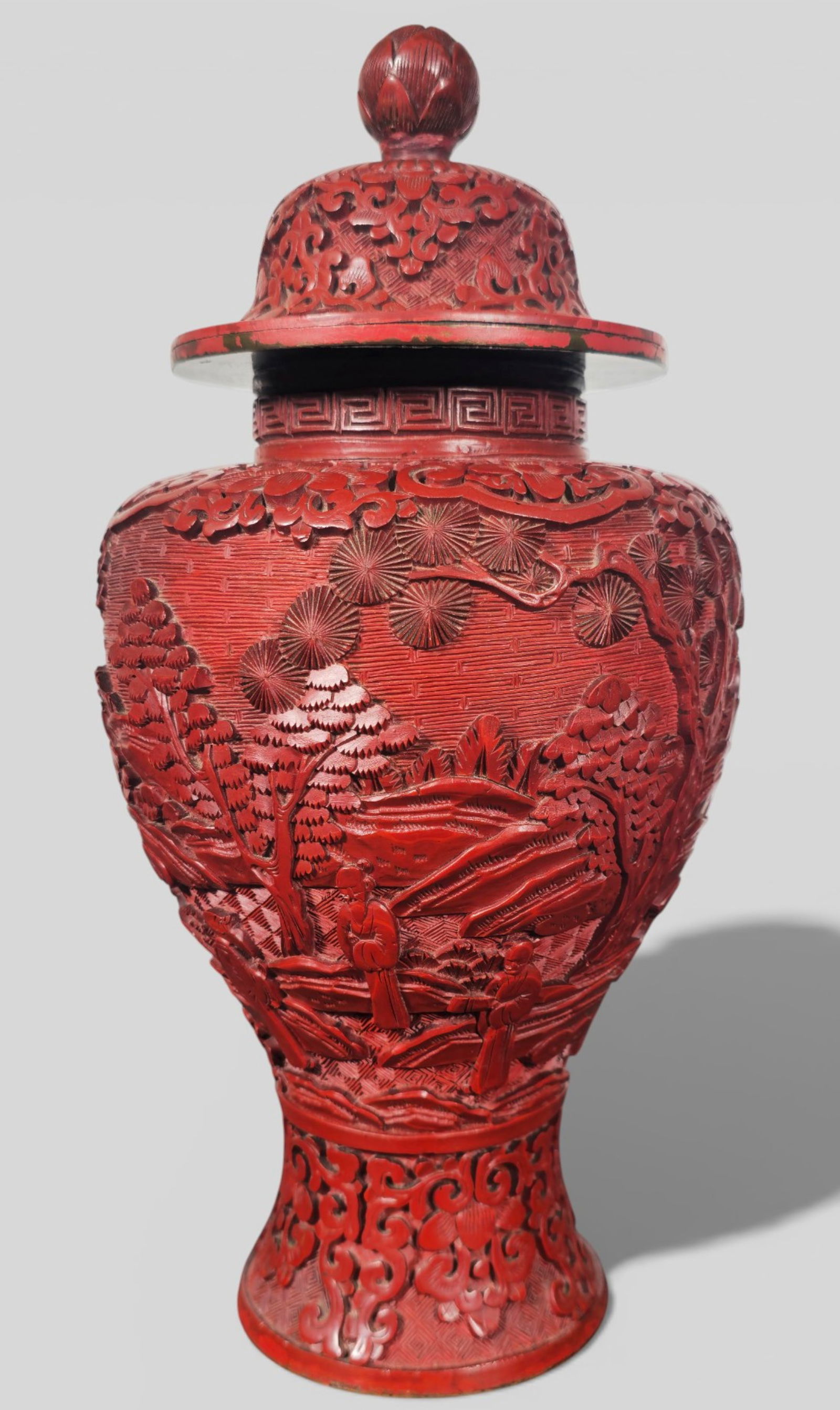 18th Century Chinese Cinnabar Carved Lacquer Jar with Lid: 18th Century Chinese Cinnabar Carved Lacquer Jar with Lid. 18th‑century Chinese cinnabar carved lacquer jar with lid, finely carved with figures in a landscape scene. The carving shows good