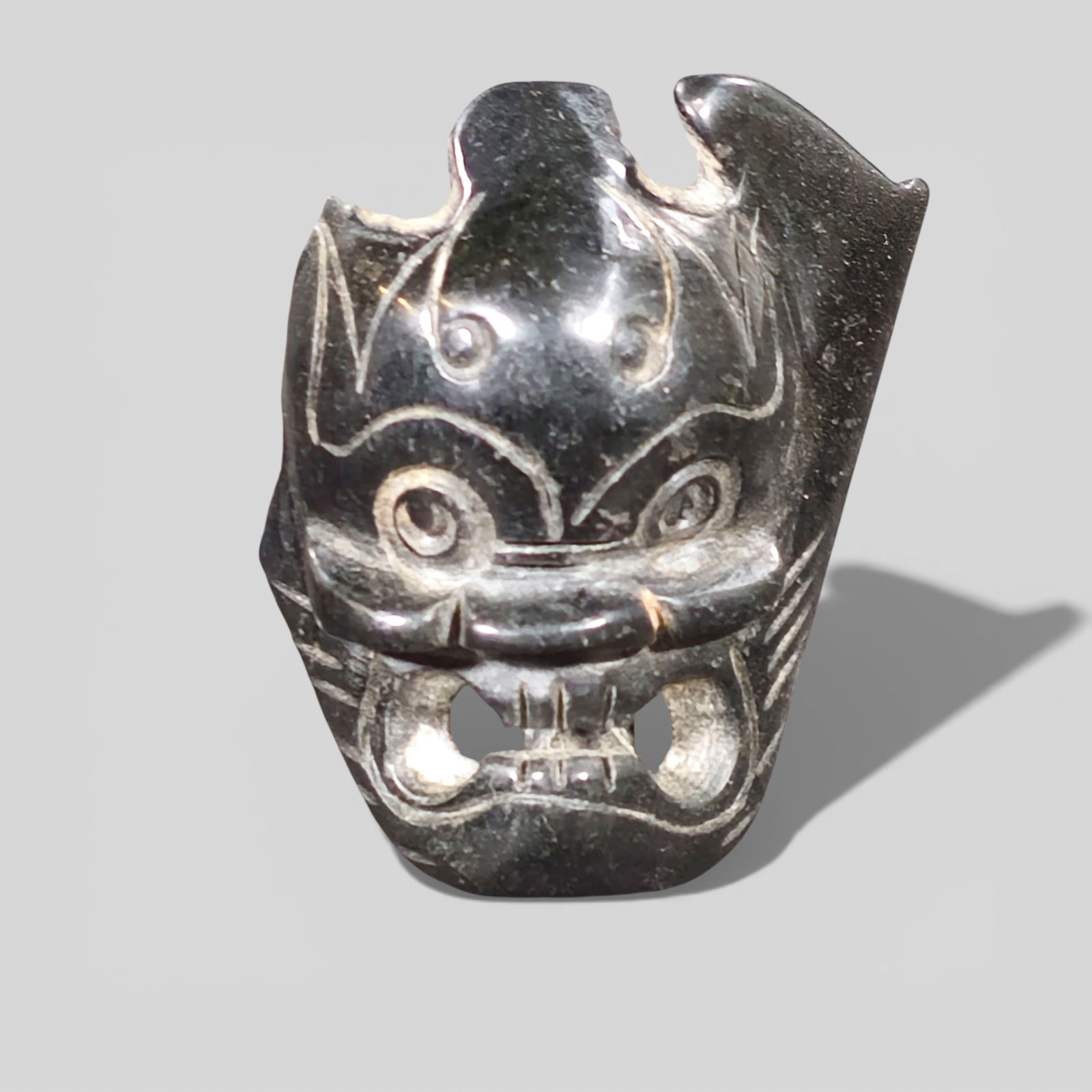 Asian Carved Black Jade Buckle in the Form of a Mask (1 of 7)