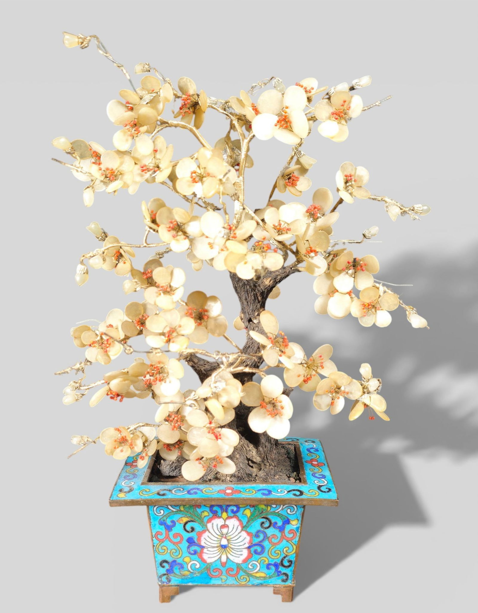 Chinese Enamel Pot with White Jade and Coral Floral Tree, 19th Century (Pot Possibly Earlier): Chinese Enamel Pot with White Jade and Coral Floral Tree, 19th Century (Pot Possibly Earlier). Decorative assemblage featuring a finely enameled Chinese pot supporting a white jade and coral floral tr