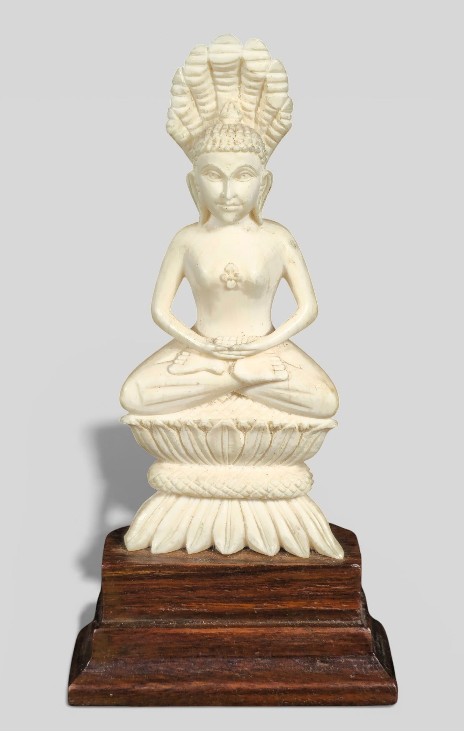 Finely Carved East Indian Siddhartha (Sikhin) Buddha Statue: Finely Carved East Indian Siddhartha (Sikhin) Buddha Statue. Finely carved East Indian figure of the Siddhartha (Sikhin) Buddha seated in meditation atop a stylized lotus throne. The carving displays
