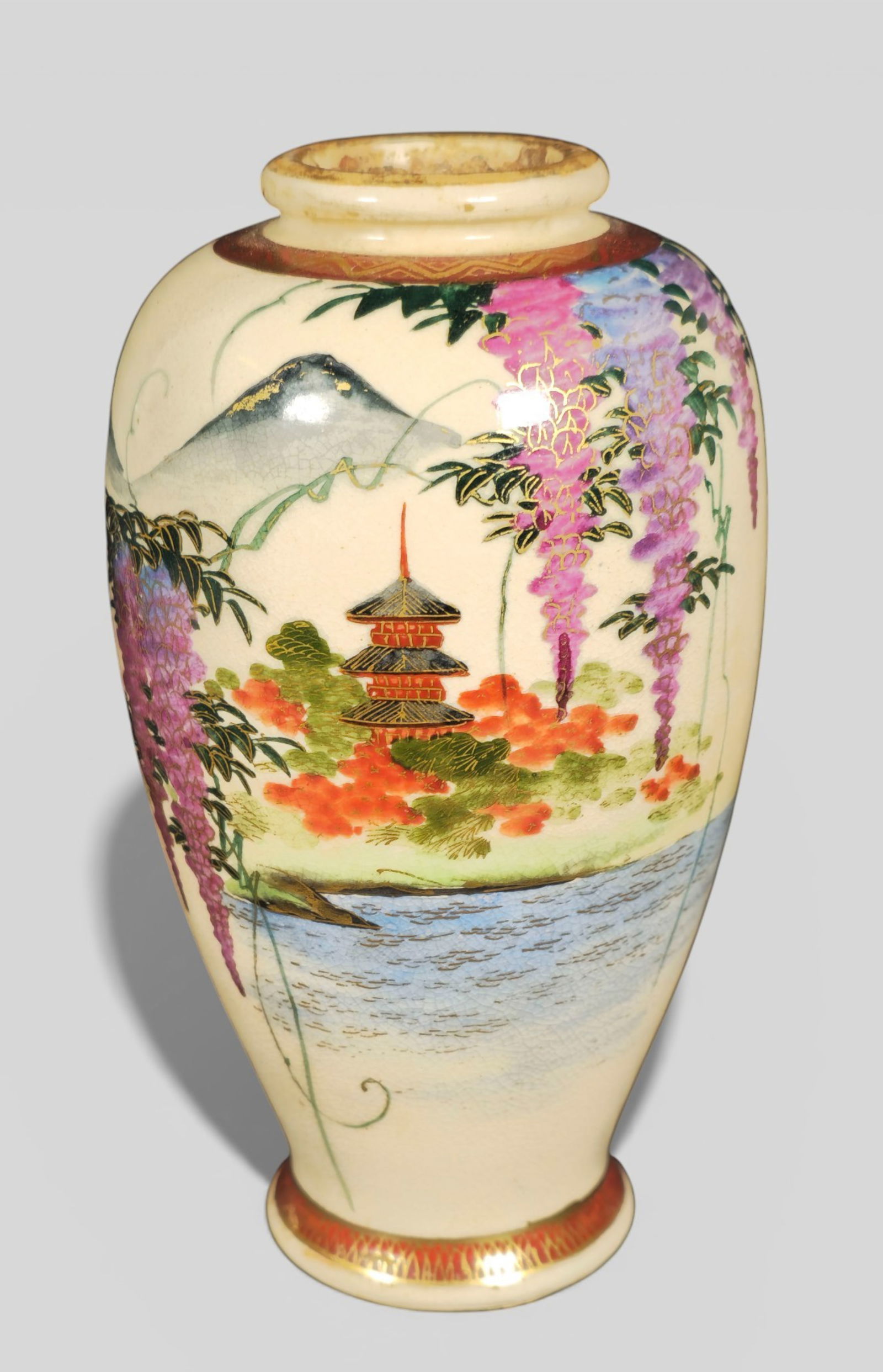 Japanese Satsuma Pottery Vase with Signature Seal: Japanese Satsuma Pottery Vase with Signature Seal. Japanese Satsuma pottery vase from the Meiji period, decorated in the richly detailed style for which Satsuma ware is celebrated. The surface feature