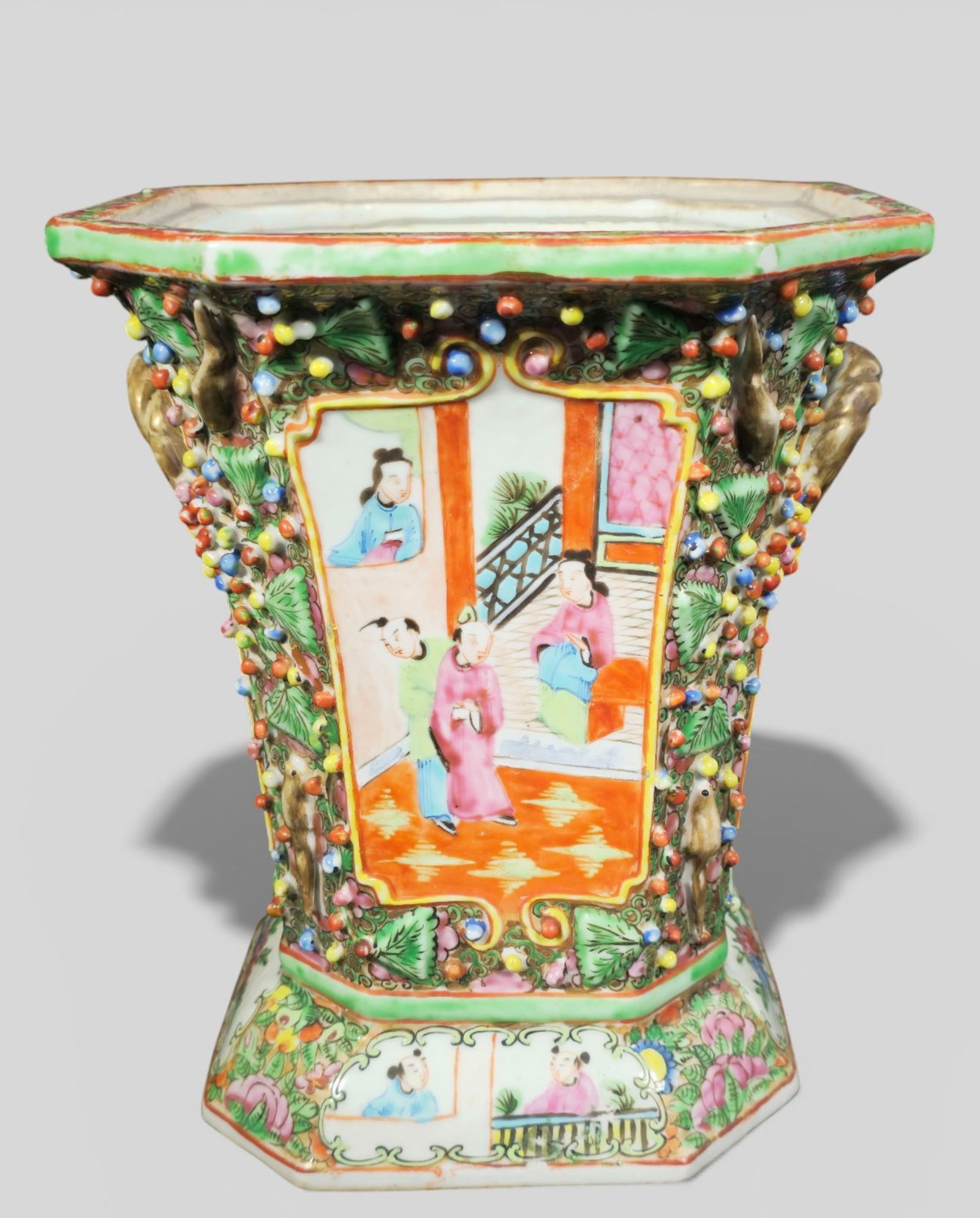 19th Century Chinese Export Rose Medallion Bough Pot: 19th Century Chinese Export Rose Medallion Bough Pot. Circa 1820-1840. Tapered trapezoid form with canted corners & intertwining gilt twig handles. Palace settings with figures, floral motif and high