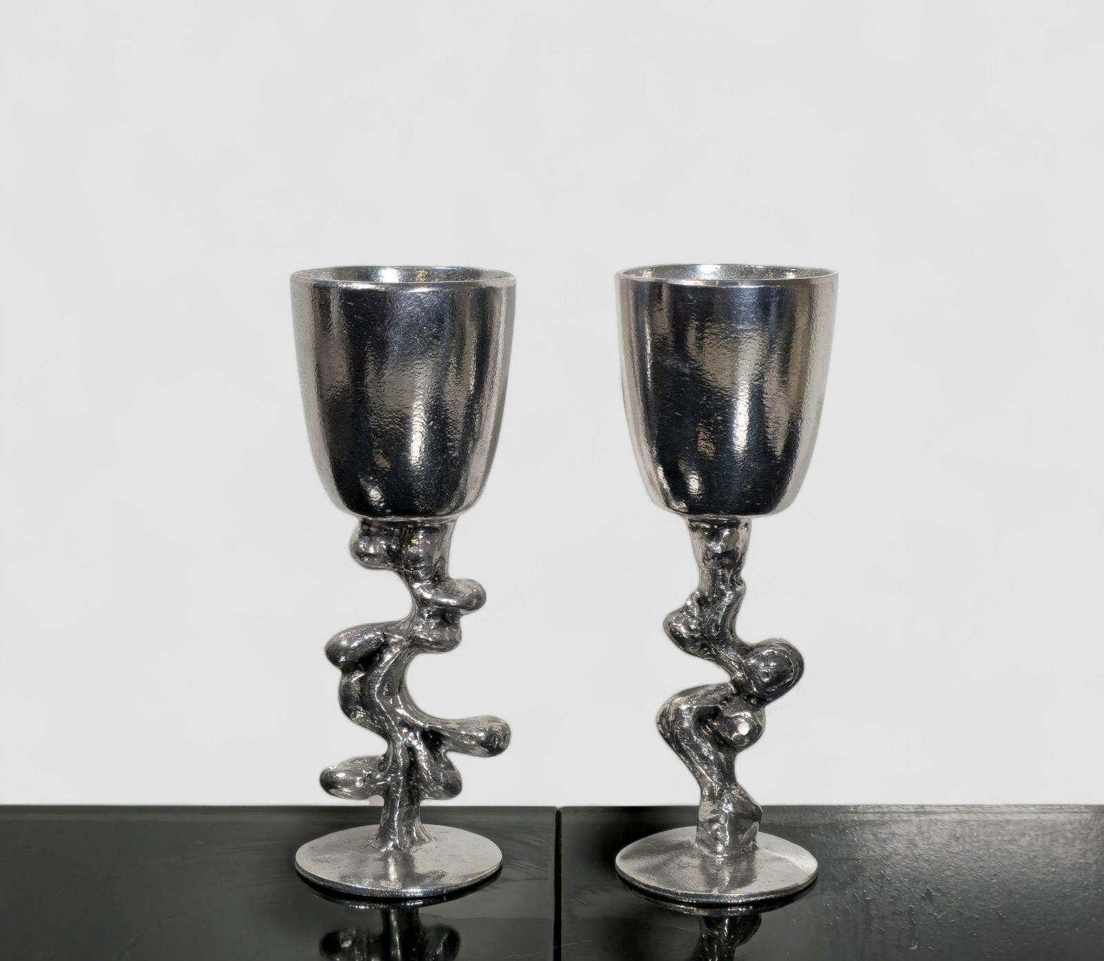 Don Drumm Wine Goblets: Donald Drumm Wine Goblets. Pair. Donald Drumm Studio. USA. 1970. Cast Aluminum. 3dia x 8 1/4h.