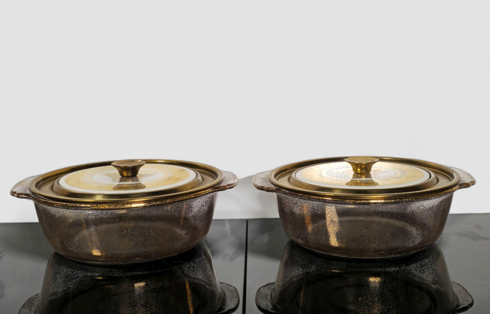 Georges Briard Fire King Casserole Dishes: Georges Briard Fire King Casserole Dishes. Pair. Anchor Hocking. 22k gold leaf over glass. 8 1/4dia x 2 3/4h