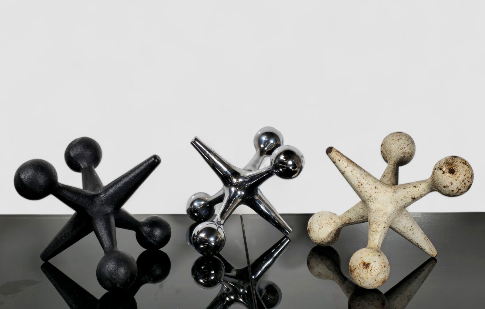 Bill Curry Jax Bookends: Bill Curry Jax Bookends. Set of 3. Design Line. USA. 1965-1967. Enameled Steel and polished chrome plated steel. 7 3/4w x 7 3/4d x 6 1/2h.