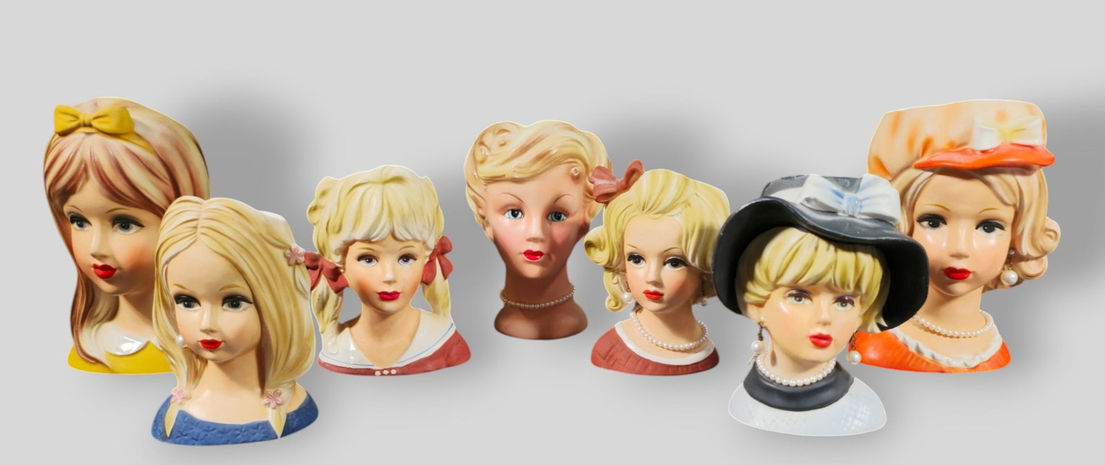 Assembled Inarco And Relpo Lady Head Vases: Assembled Inarco And Relpo Lady Head Vases. 7 total. 3 Inarco, 2 Relpo and 4 various. Various size and form. Smallest 4w x 3 1/8d x 5 1/2h.