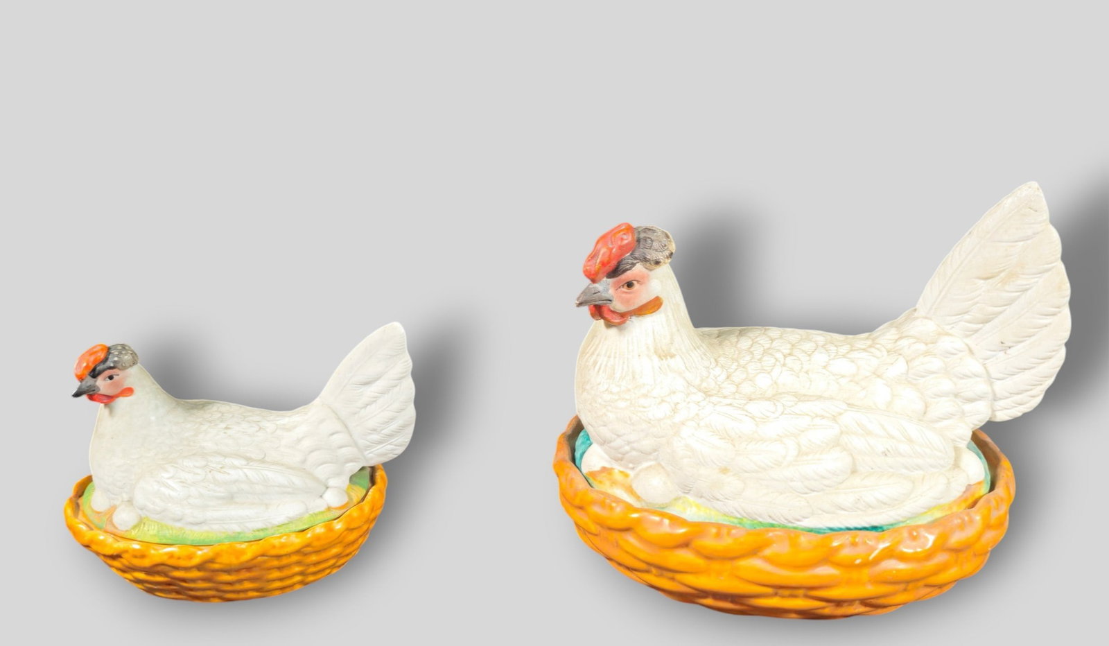 19th Century Staffordshire Covered Boxes: 19th Century Staffordshire Covered Boxes. Two. Circa 1880. Larger 9w x 6 1/2d x 7 1/2h. Smaller 6 1/2w x 4 1/2d x 4 3/4h.
