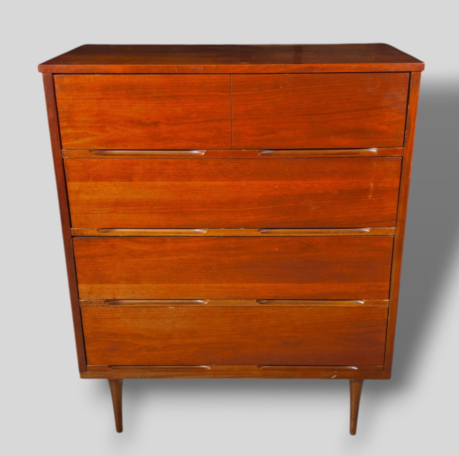 MCM Walnut Dresser / Chest: Mid Century Modern dresser / Chest. USA, 1960s. 4 drawers. Walnut. 34 1/4w x 18 1/4d x 41 1/4h.