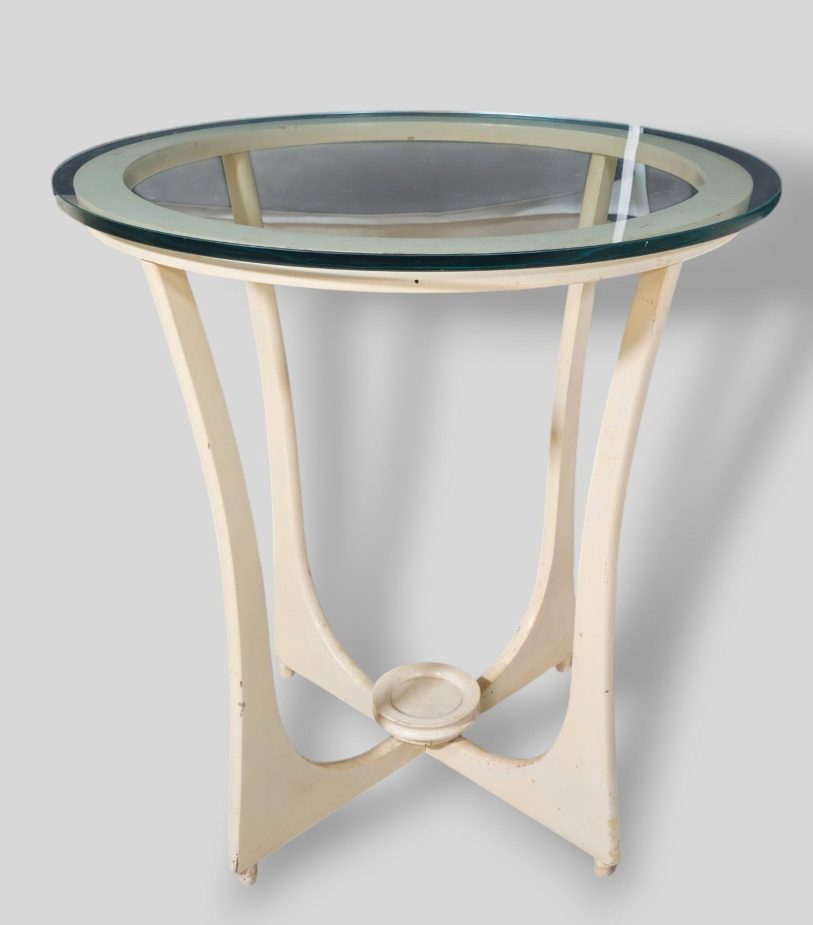 MCM Glass Top Table: MCM Glass Top Table. USA. 1968. Glass and lacquered wood. Lower plant stand. 25 1/2dia x 27 1/2h.