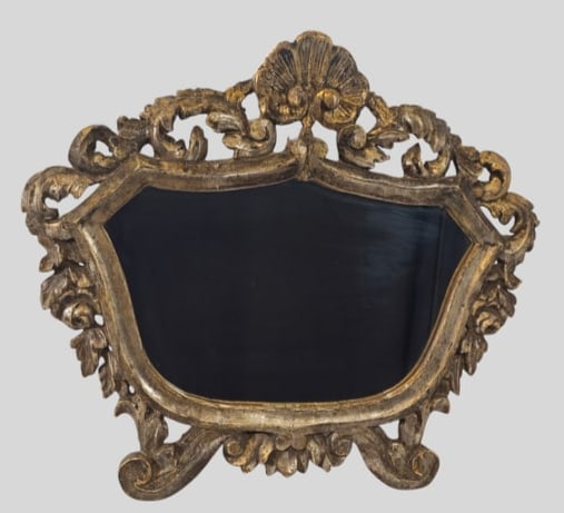 19th Century Carved Silverleaf Wood Mirror: 19th Century Carved Silverleaf Wood Mirror. Circa 1840-1860. Carved shell center pediment with scrolled and carved acanthus leaf and floral frame. 24w x 2d x 21h.