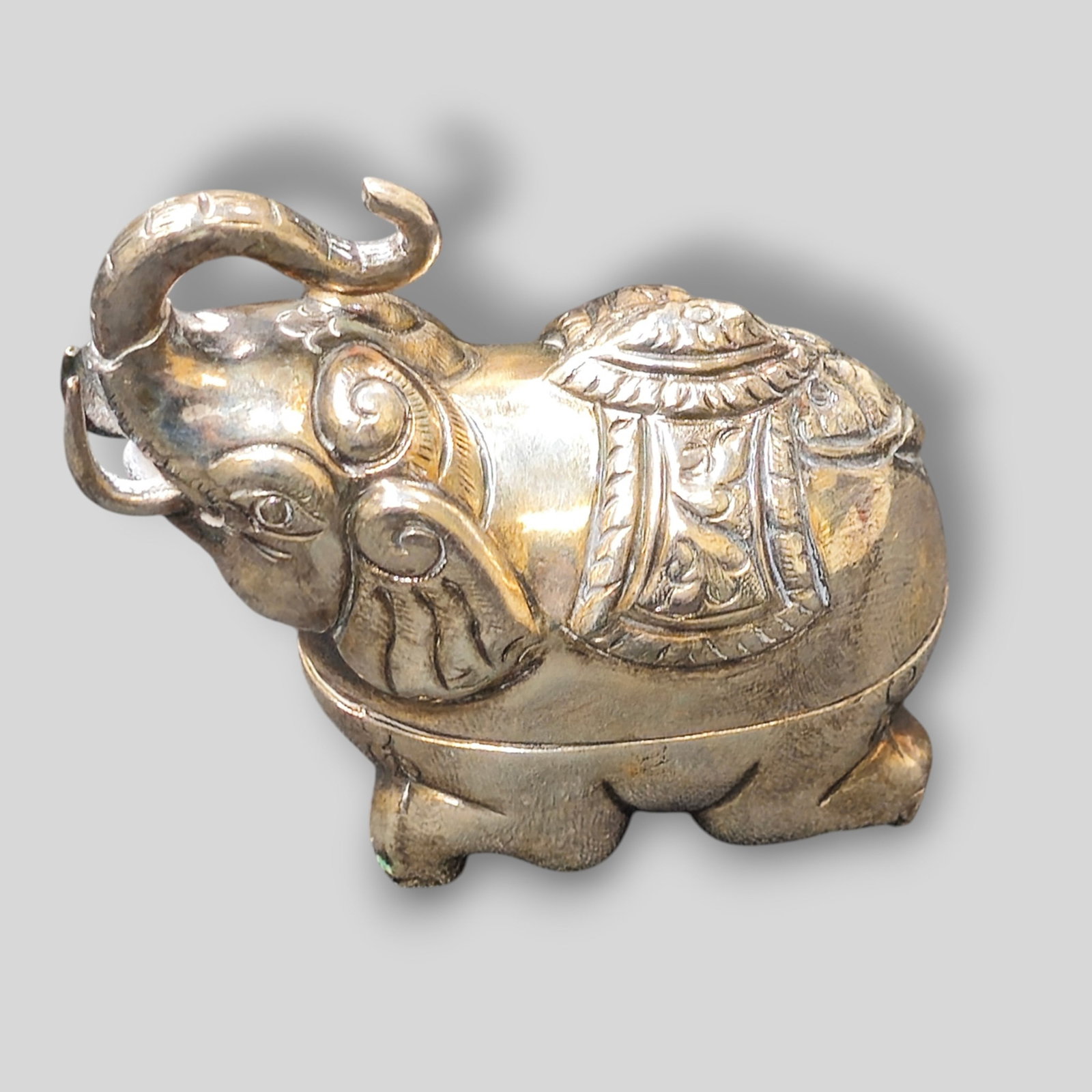 Antique Cambodian Silver Elephant Pill Box: Antique Cambodian Silver Elephant Pill Box. Hand made and chased turn of the century box. Khmer Silver (usually 90% silver) Stamped 90% Silver to underside. 2 3/8w x 1d x 2 1/4h. Weight
